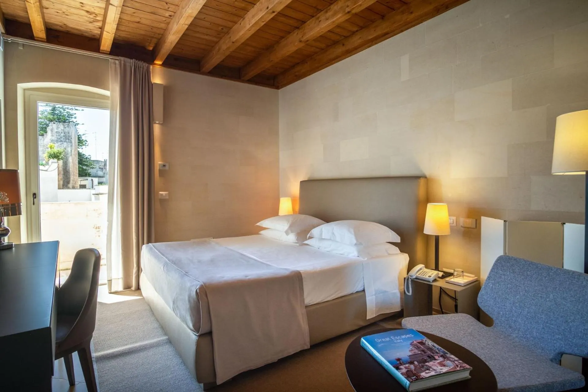 Bed in La Fiermontina Luxury Home Hotel