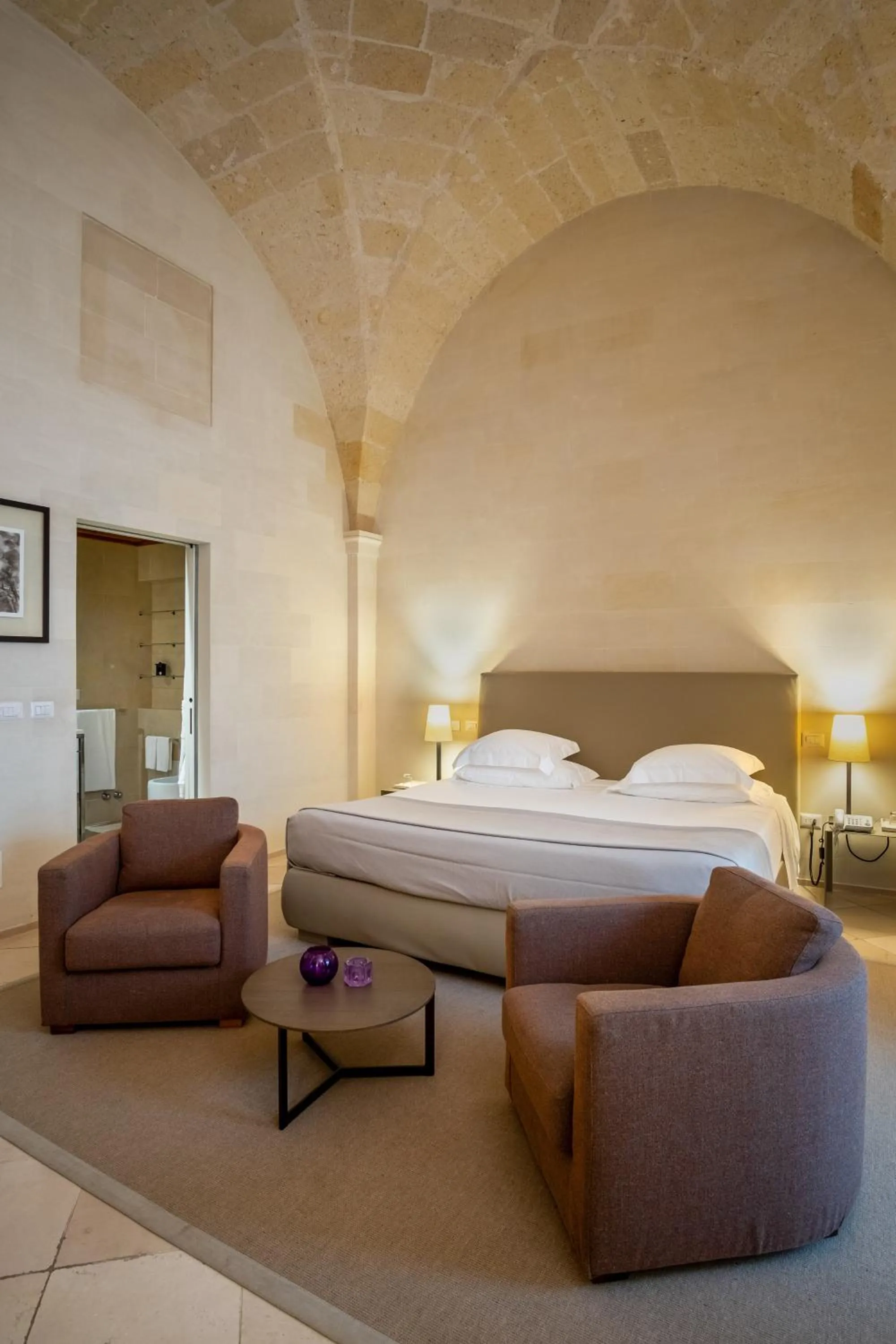 Bed in La Fiermontina Luxury Home Hotel