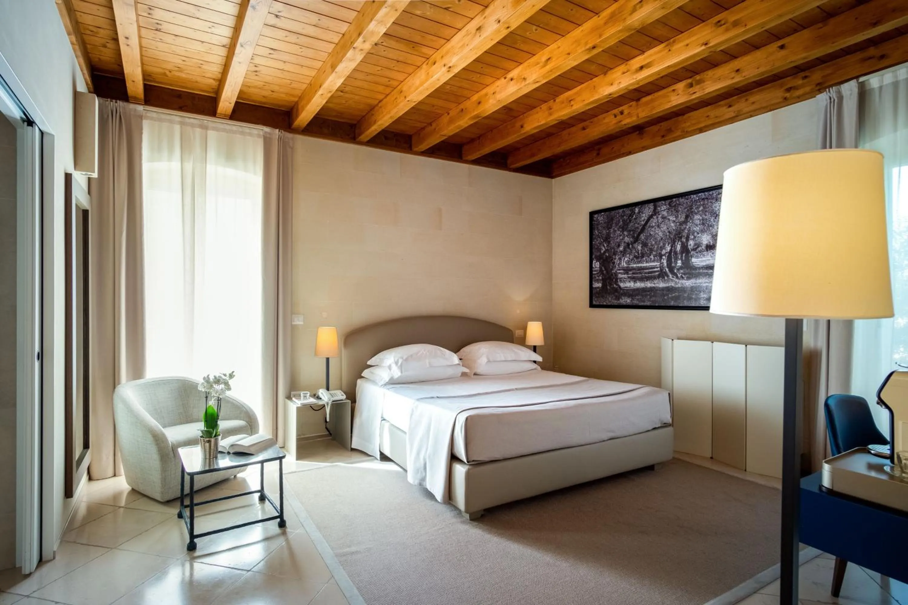 Bed in La Fiermontina Luxury Home Hotel