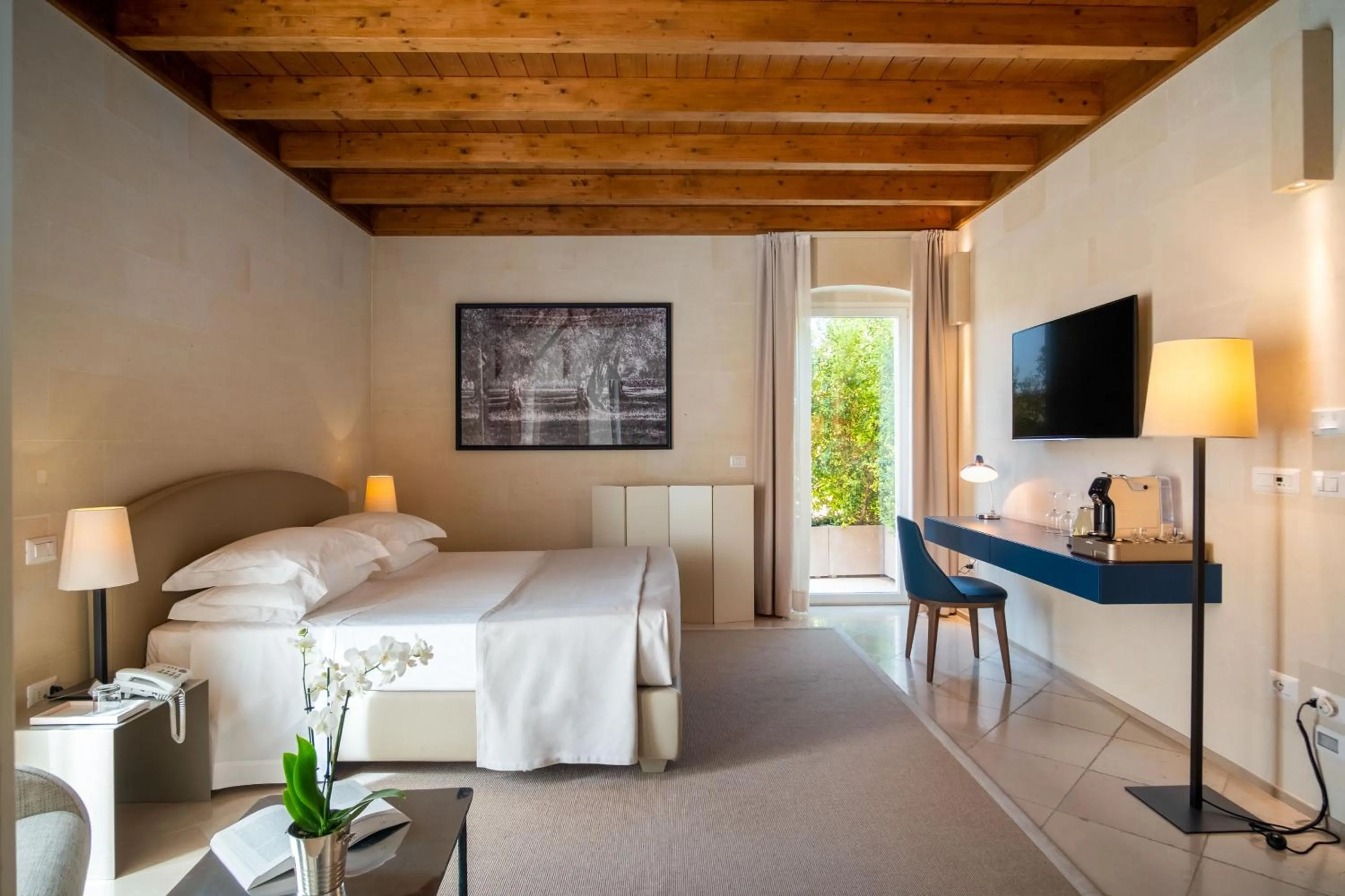 Bed in La Fiermontina Luxury Home Hotel