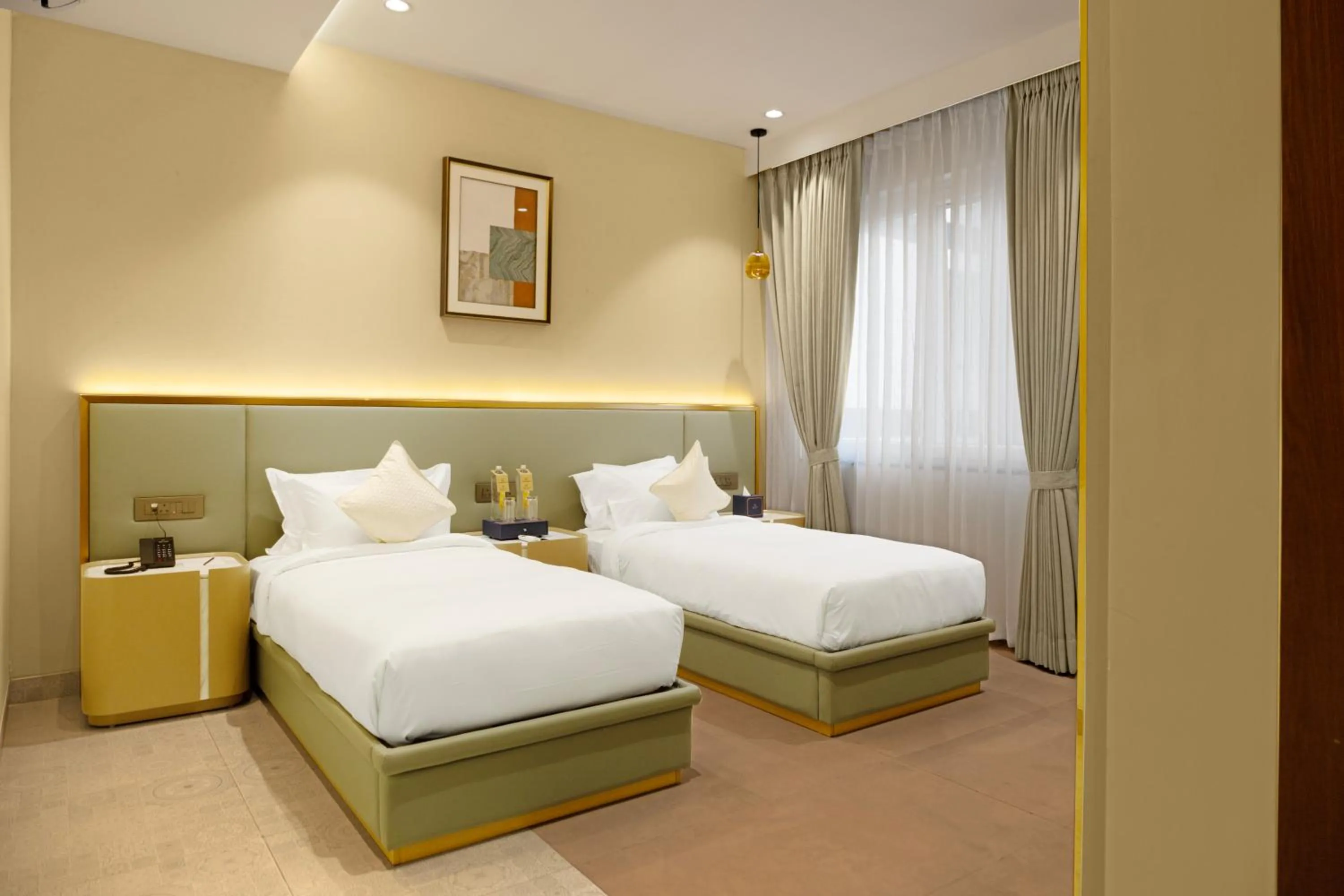 Bed in Quad Hotels Hyderabad