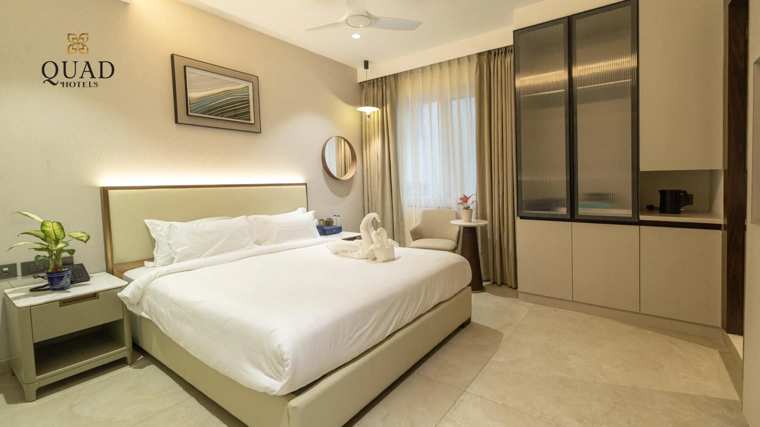 Bed in Quad Hotels Hyderabad