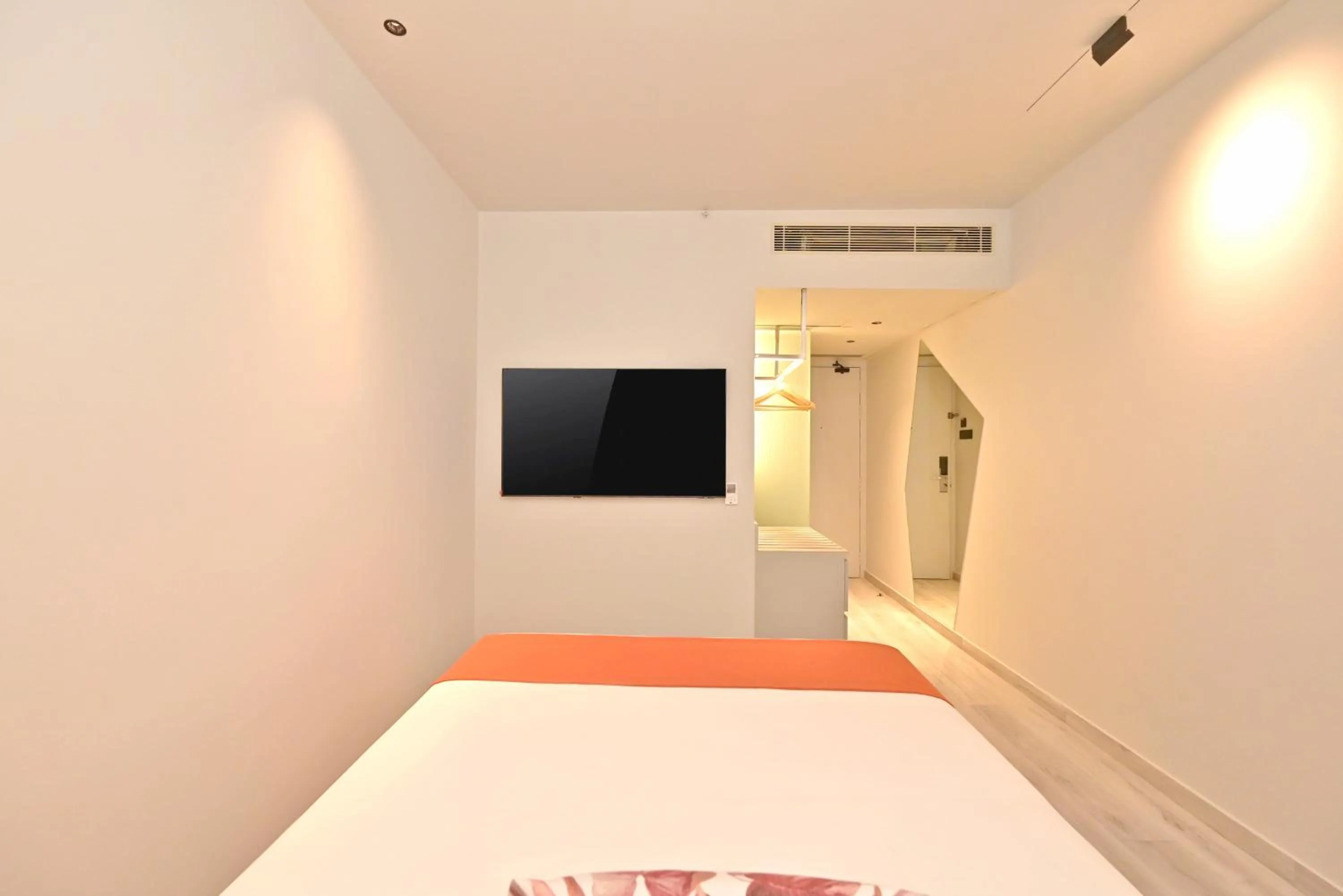 Bedroom, Bed in Ira by Orchid Hyderabad Hitech City Mindspace IT Park