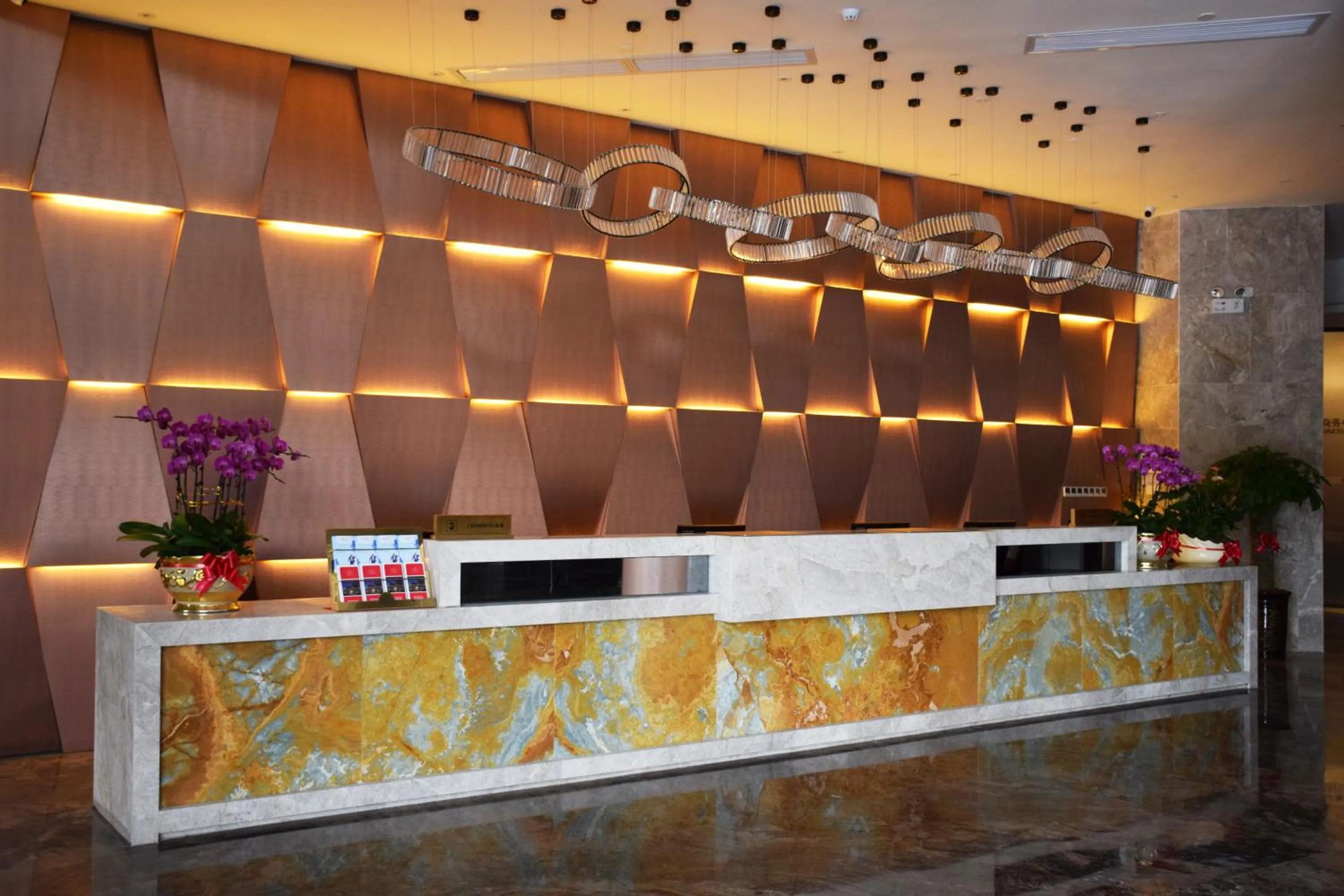 Lobby or reception in Ramada Foshan Hotel