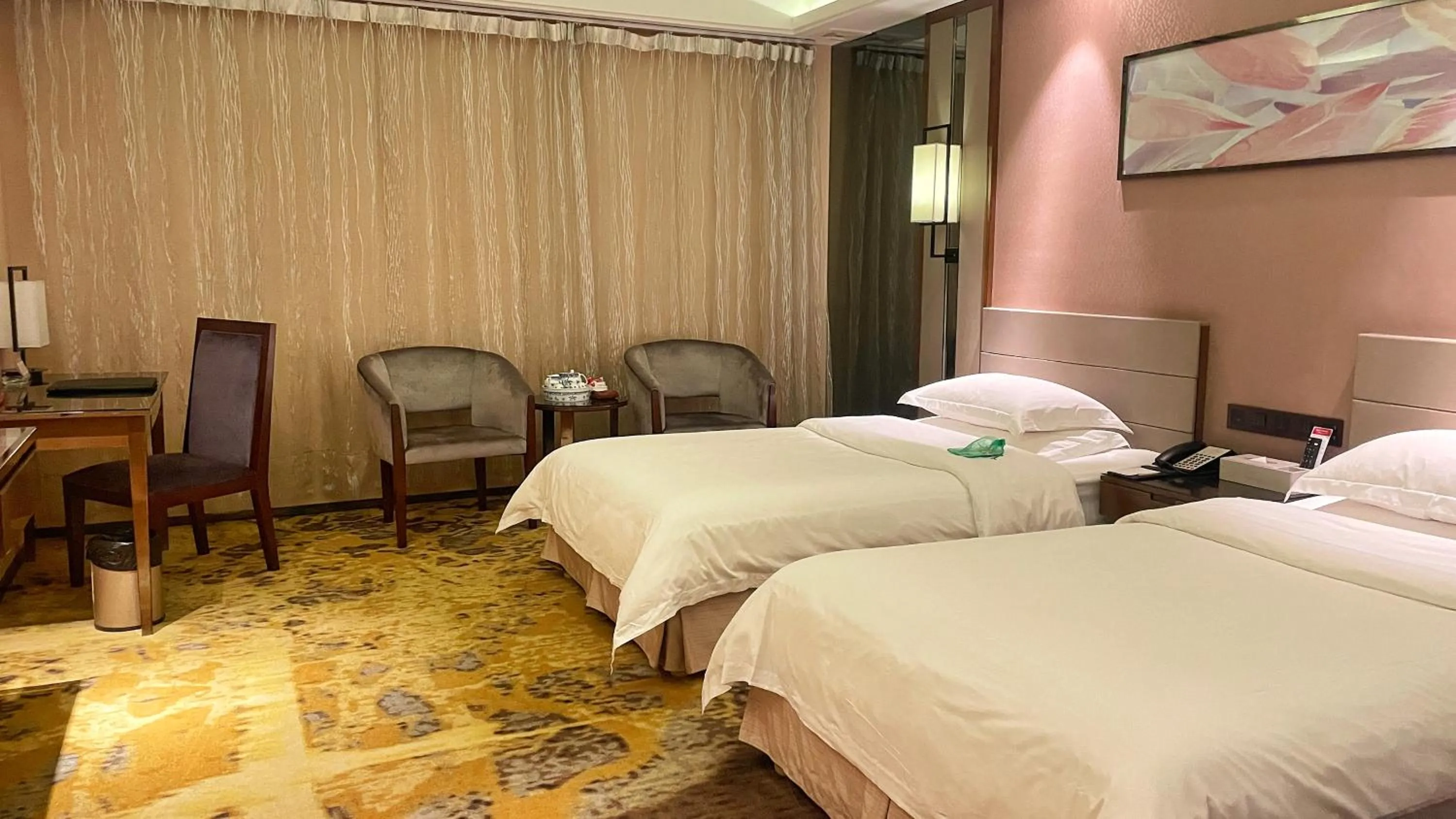 Bed in Ramada Foshan Hotel