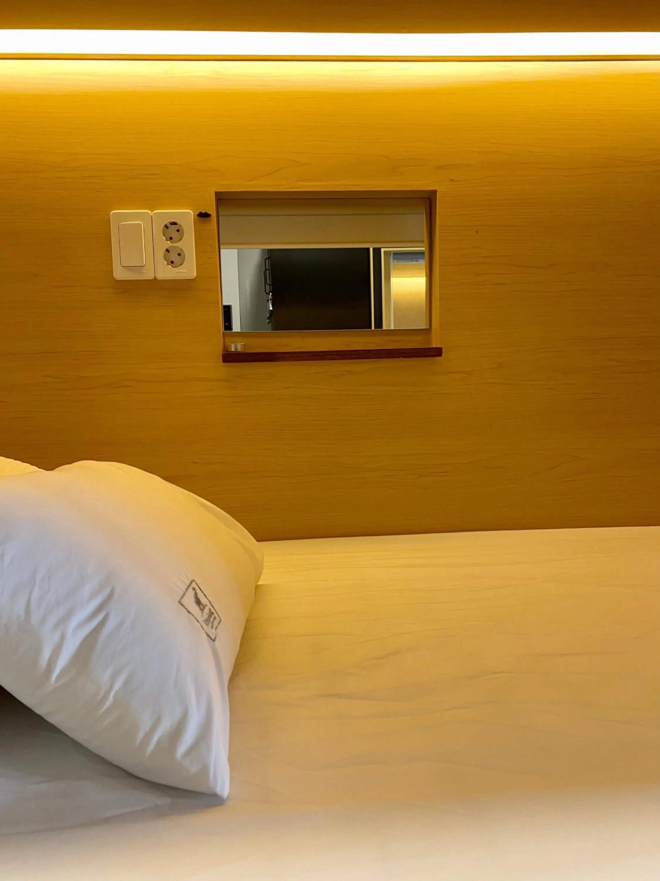 Bed in Elephant Hostel Nampo