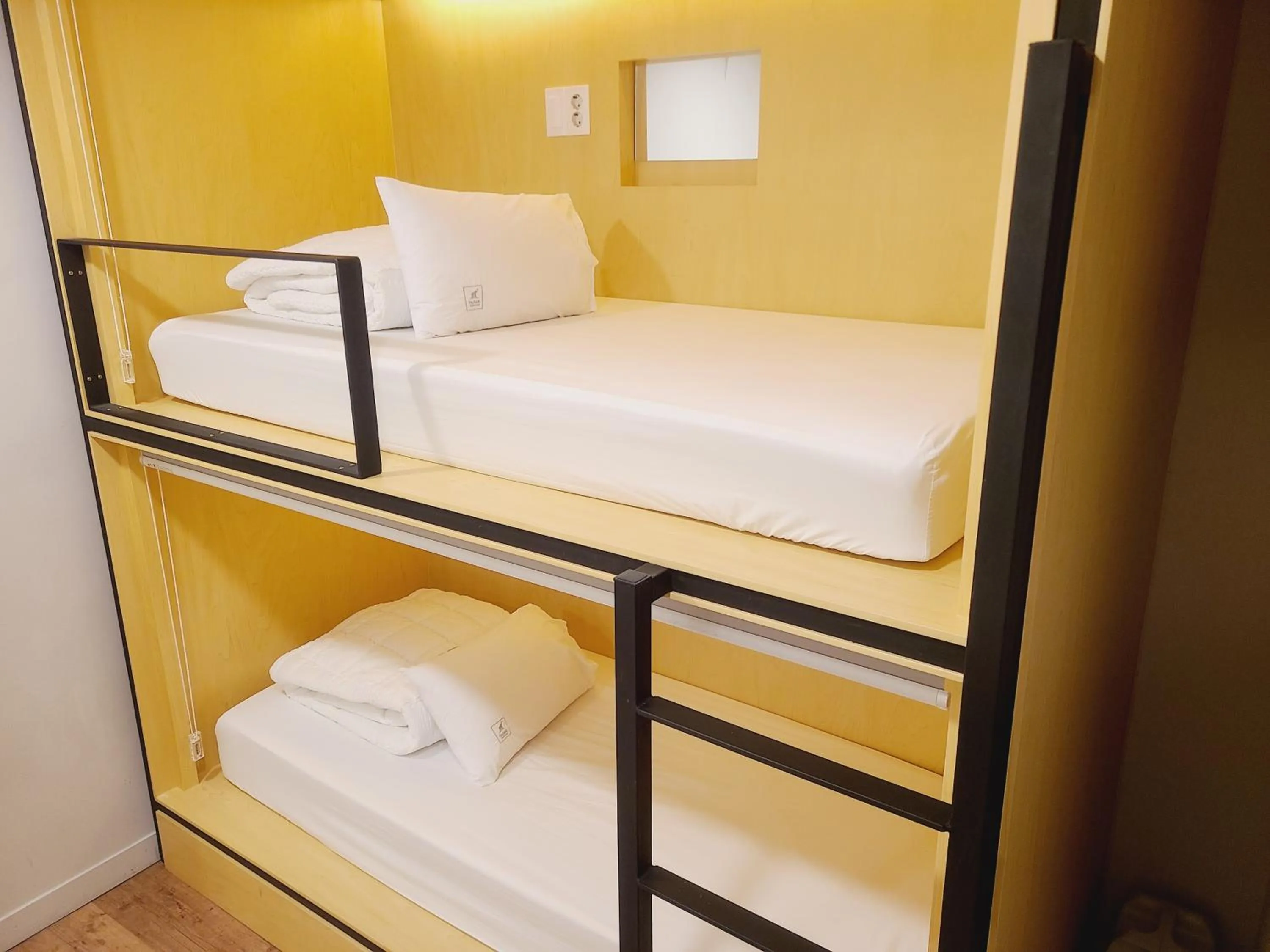 Bed in Elephant Hostel Nampo