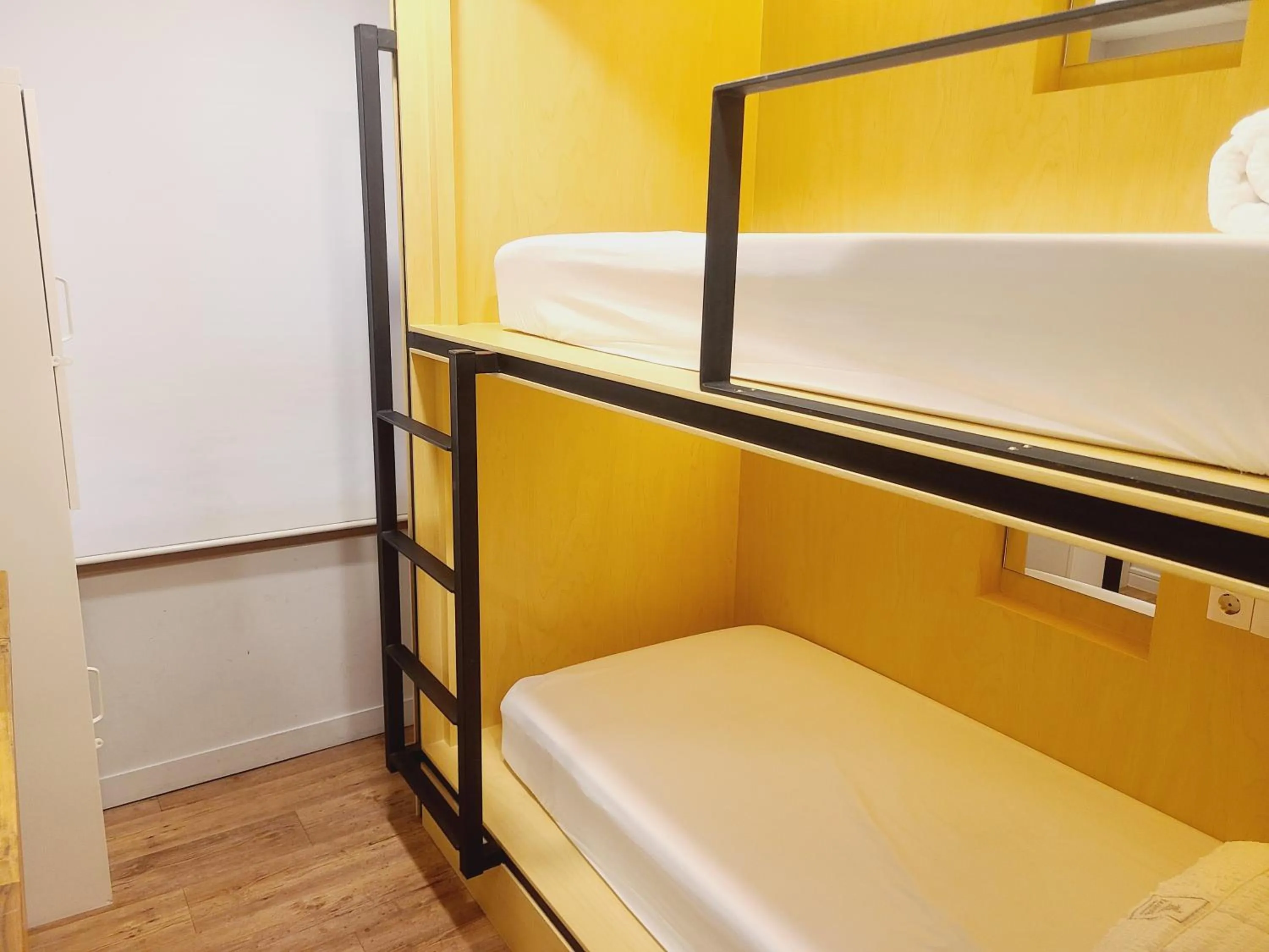 Bed in Elephant Hostel Nampo