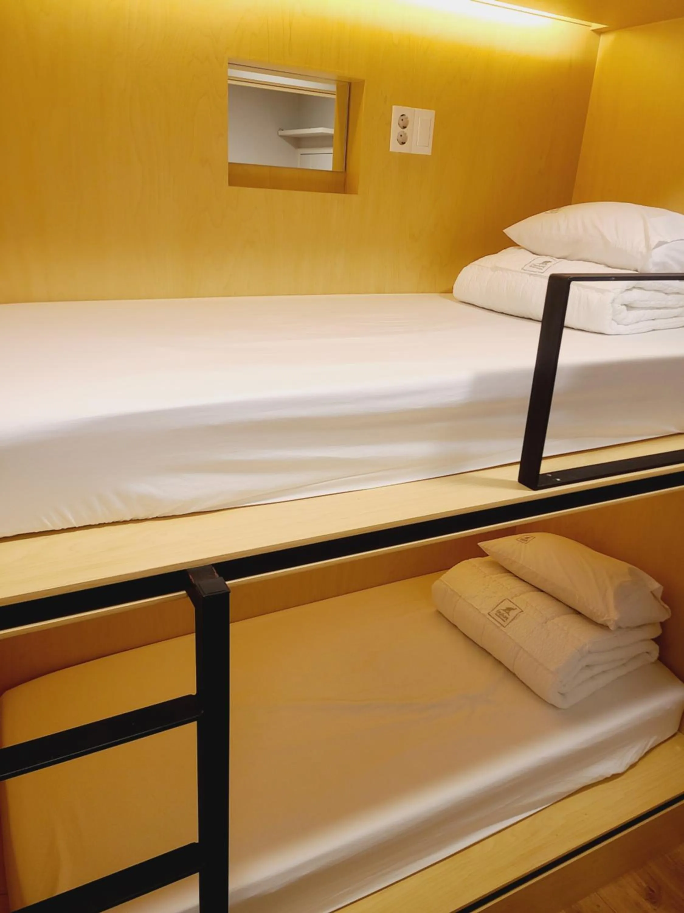 Bed in Elephant Hostel Nampo