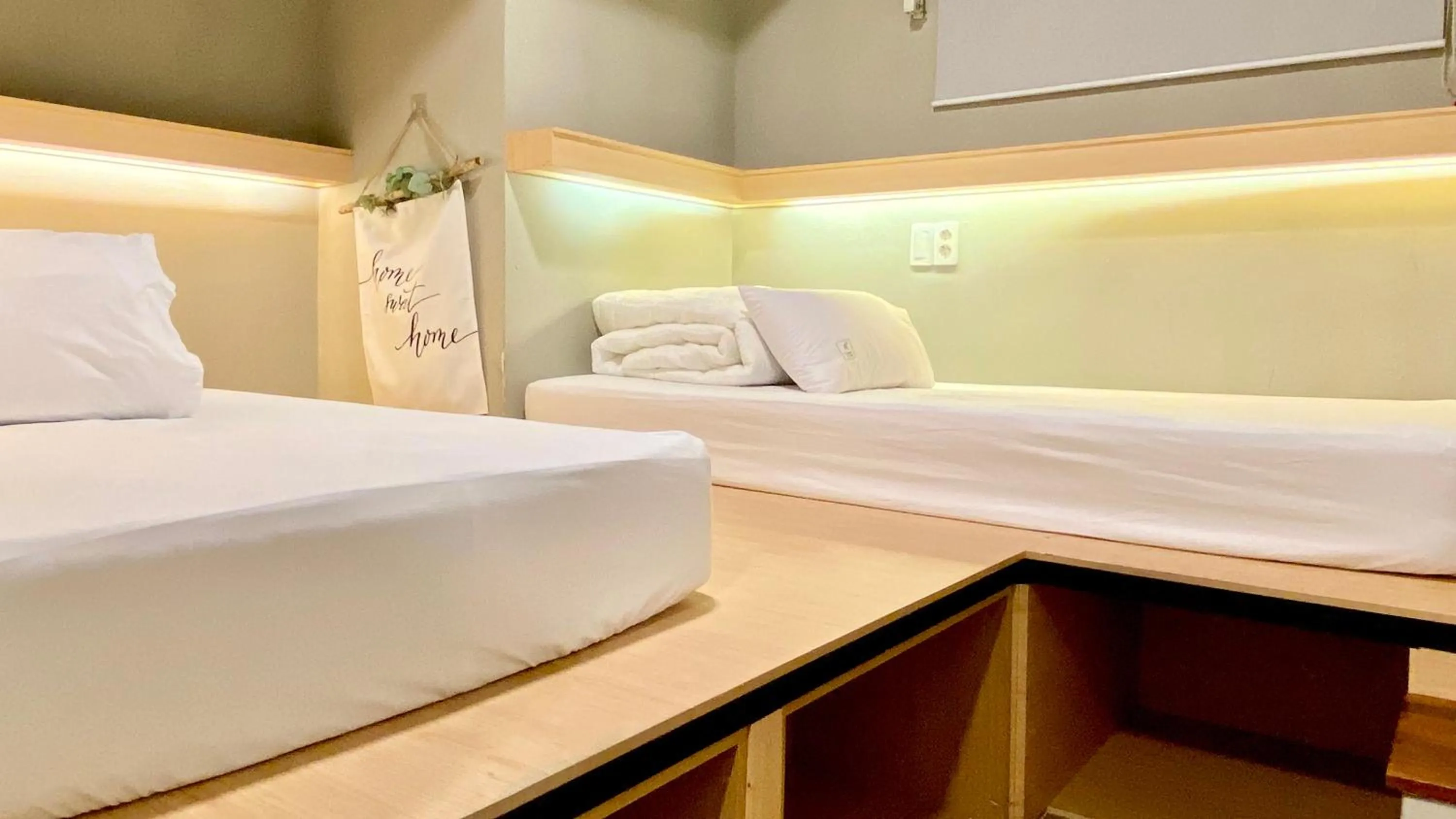 Bed in Elephant Hostel Nampo