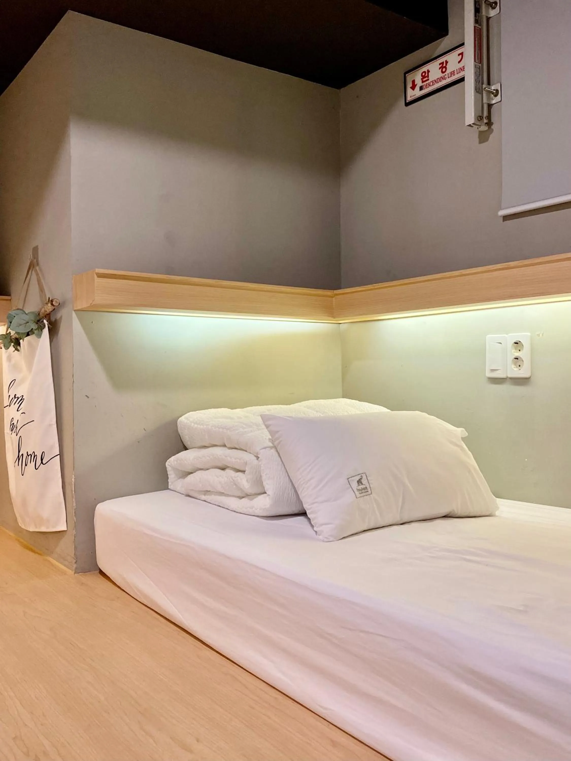 Bed in Elephant Hostel Nampo