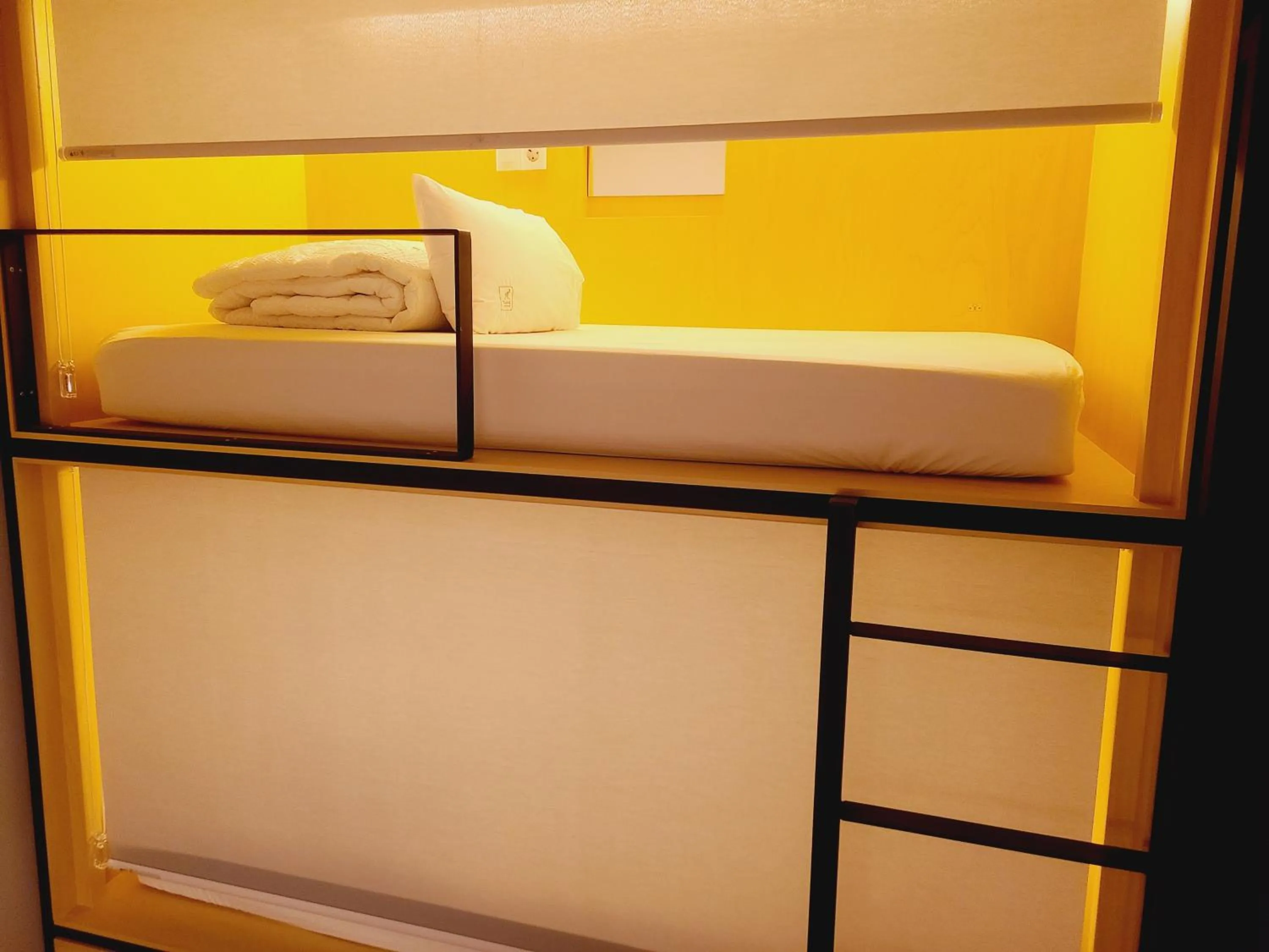 Bed in Elephant Hostel Nampo