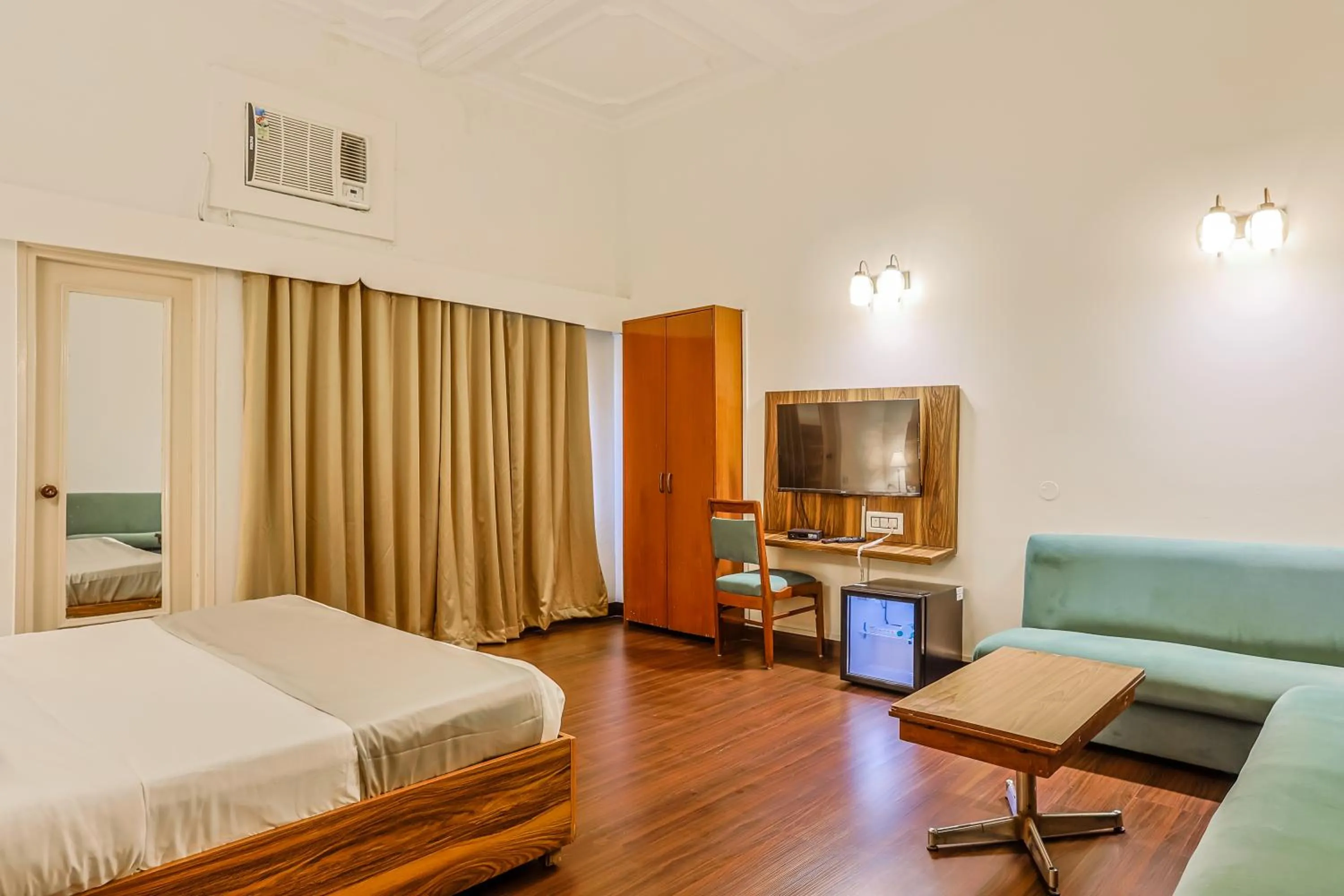 Bed in asar CP Outer Circle by Orion Hotels