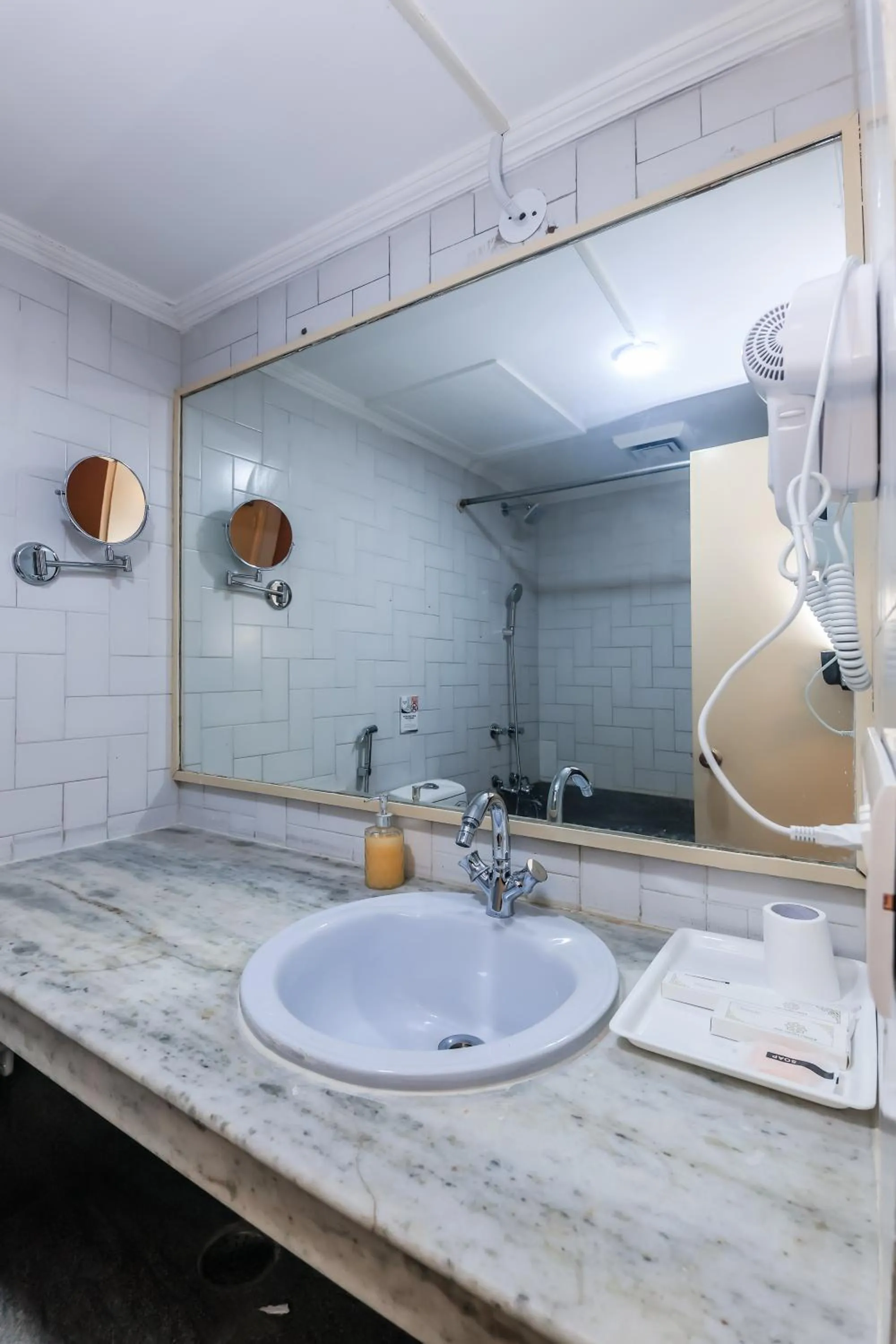 Bathroom in asar CP Outer Circle by Orion Hotels