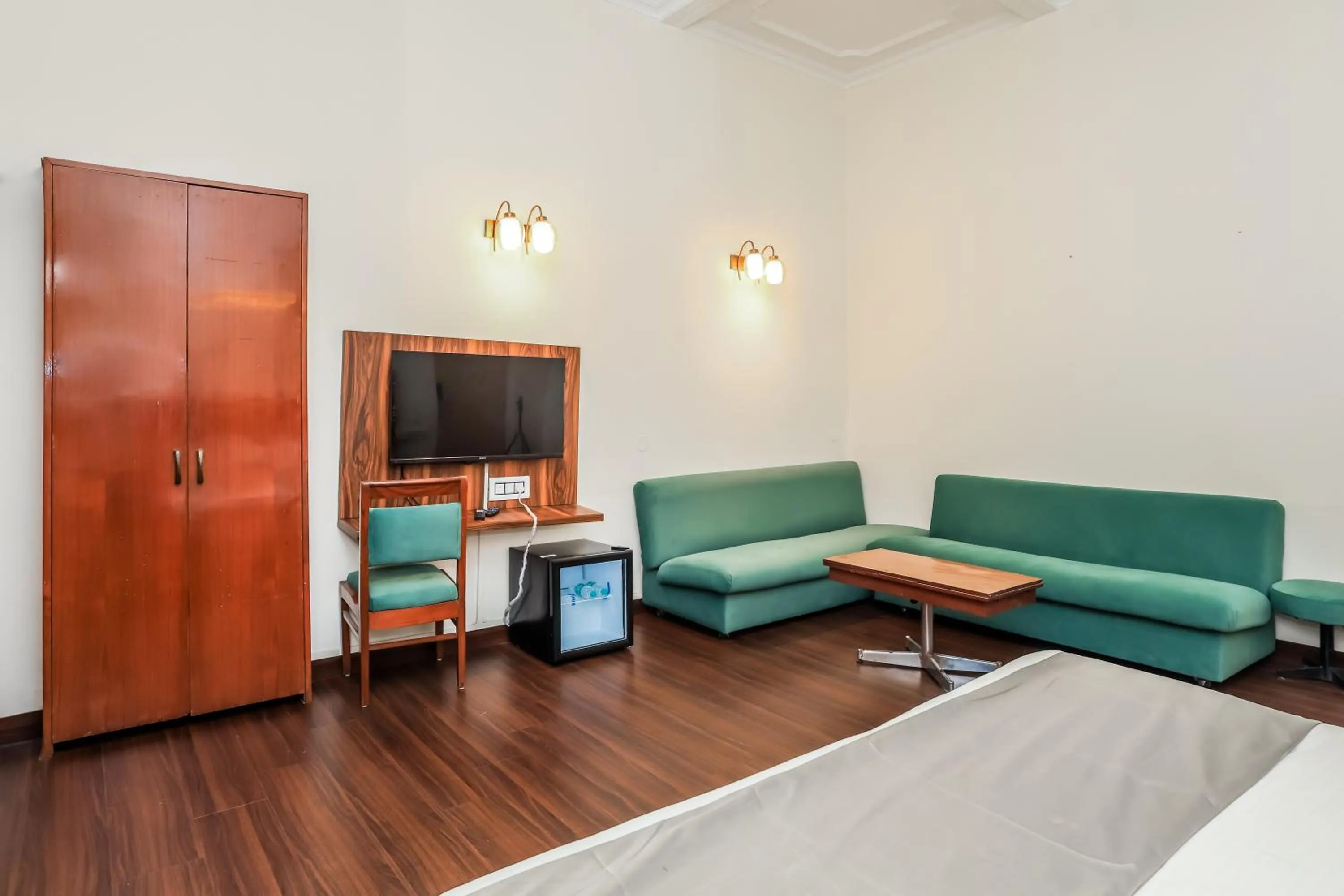 Bed in asar CP Outer Circle by Orion Hotels