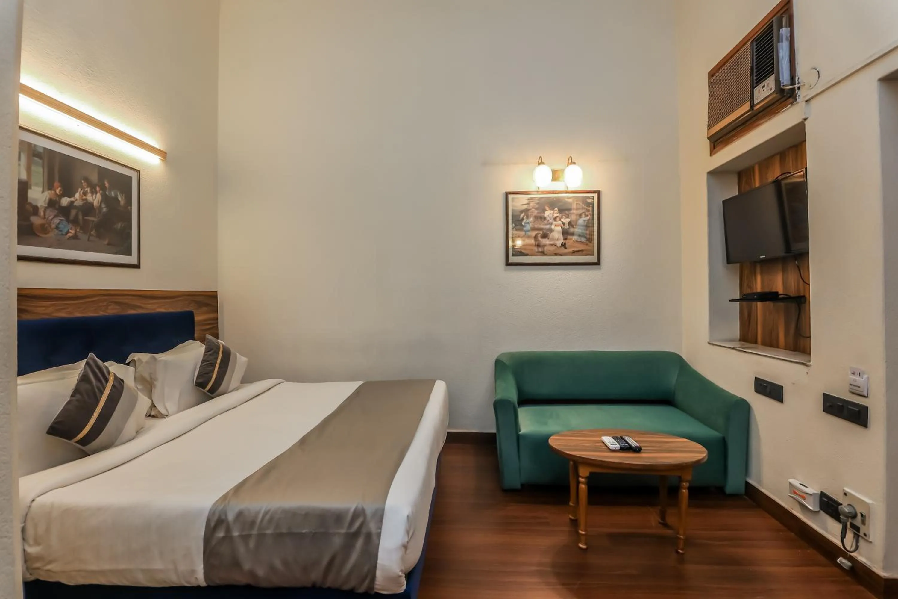Bed in asar CP Outer Circle by Orion Hotels