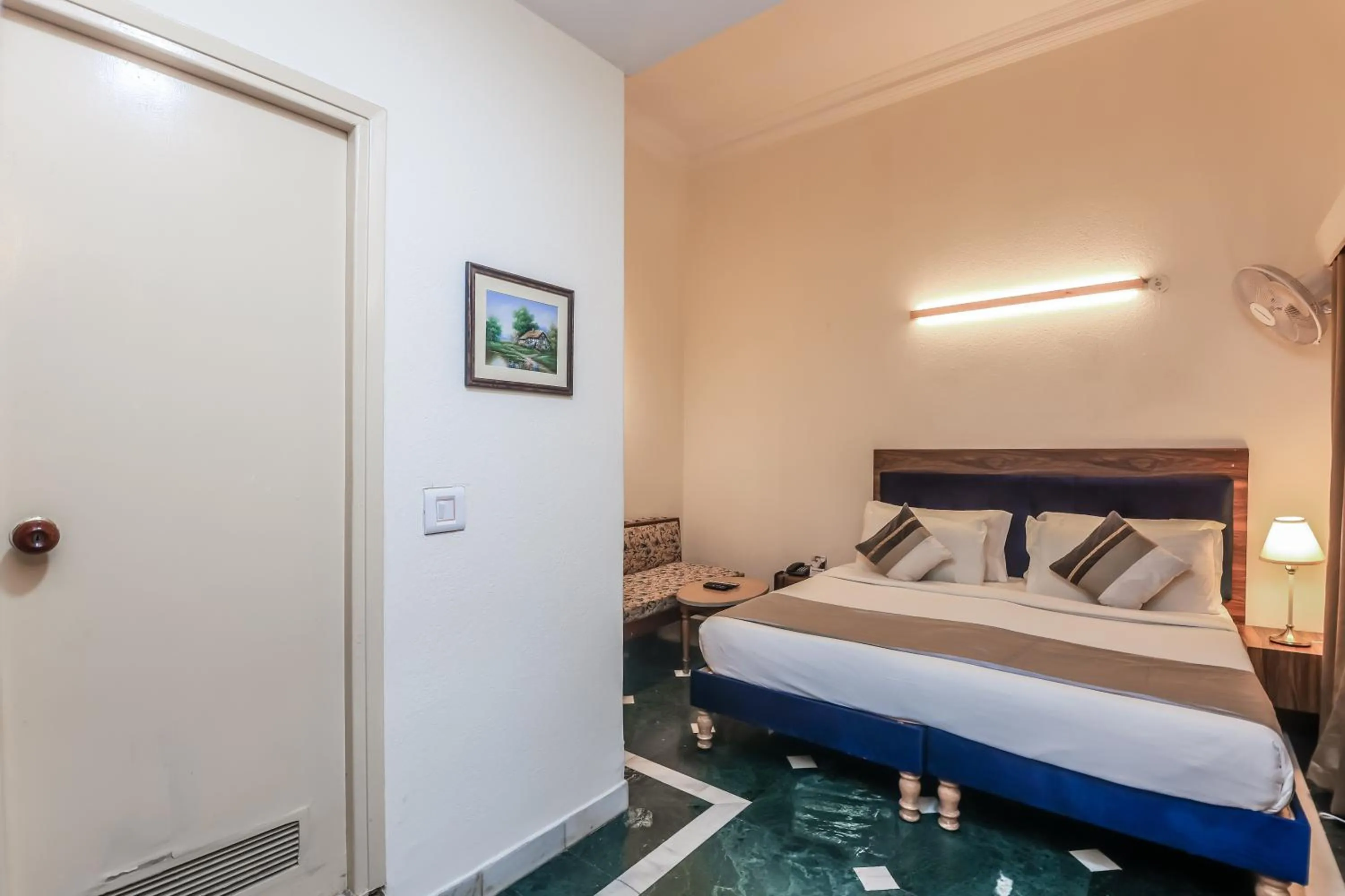 Bed in asar CP Outer Circle by Orion Hotels
