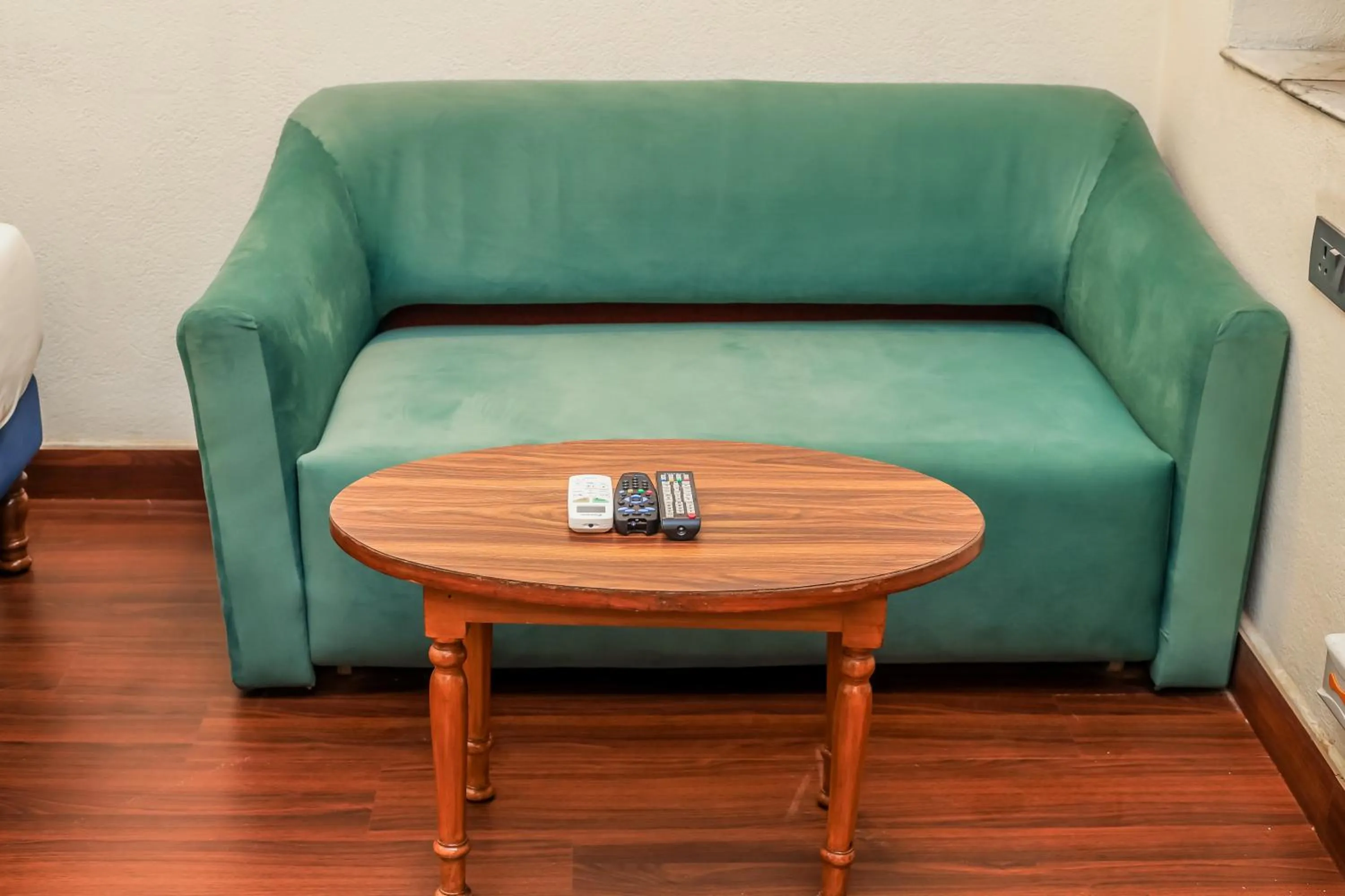 Seating area in asar CP Outer Circle by Orion Hotels