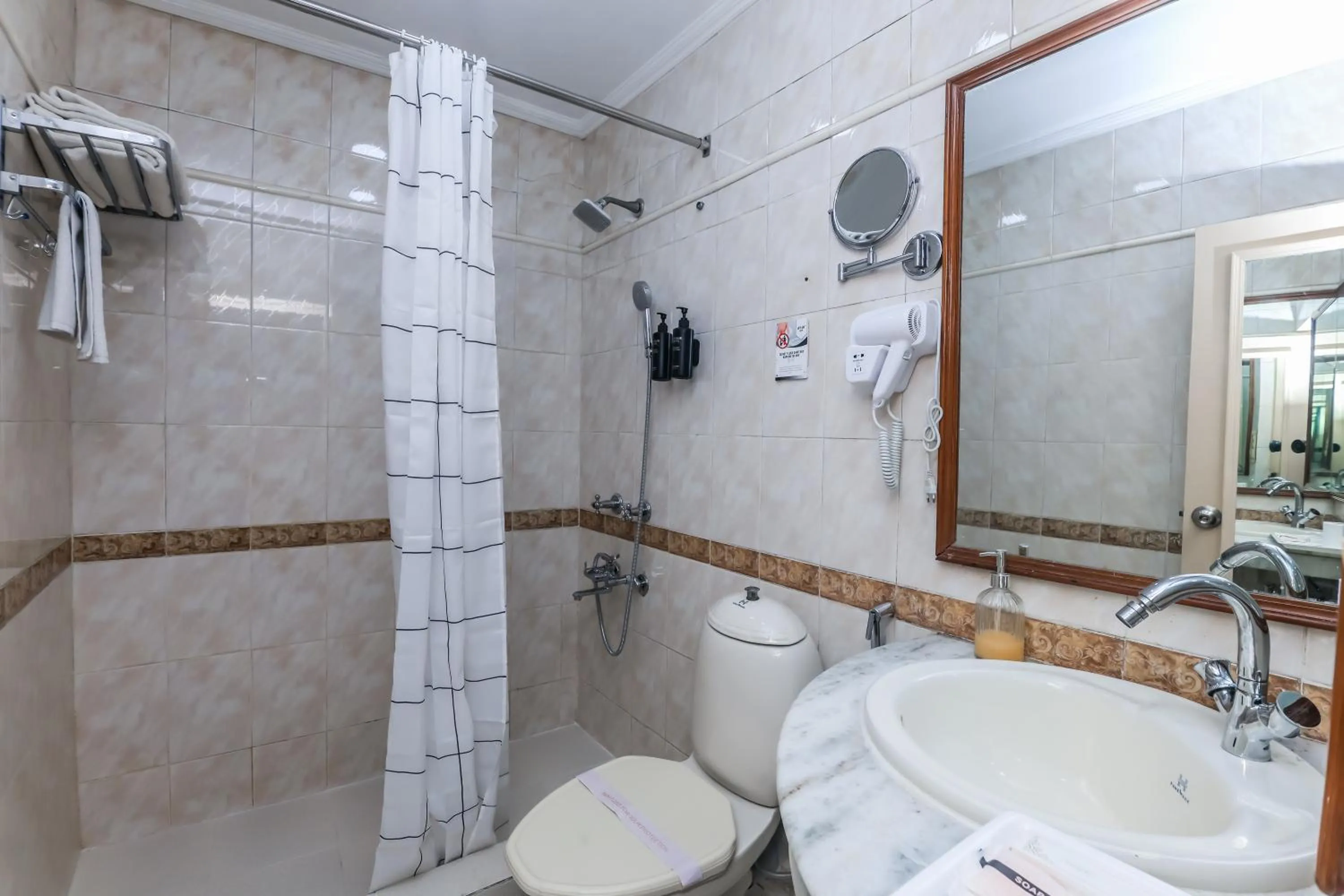 Bathroom in asar CP Outer Circle by Orion Hotels