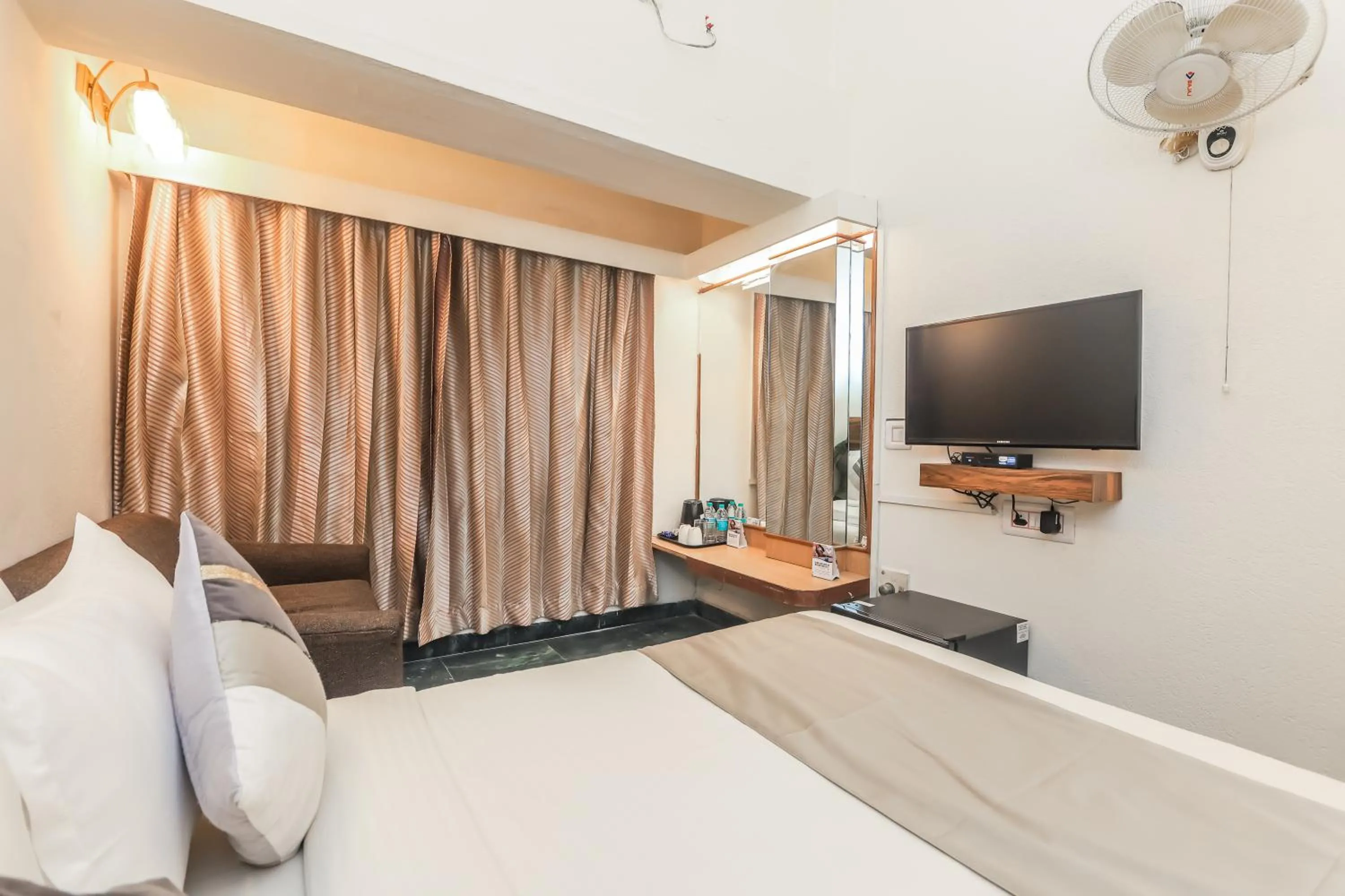Bedroom in asar CP Outer Circle by Orion Hotels