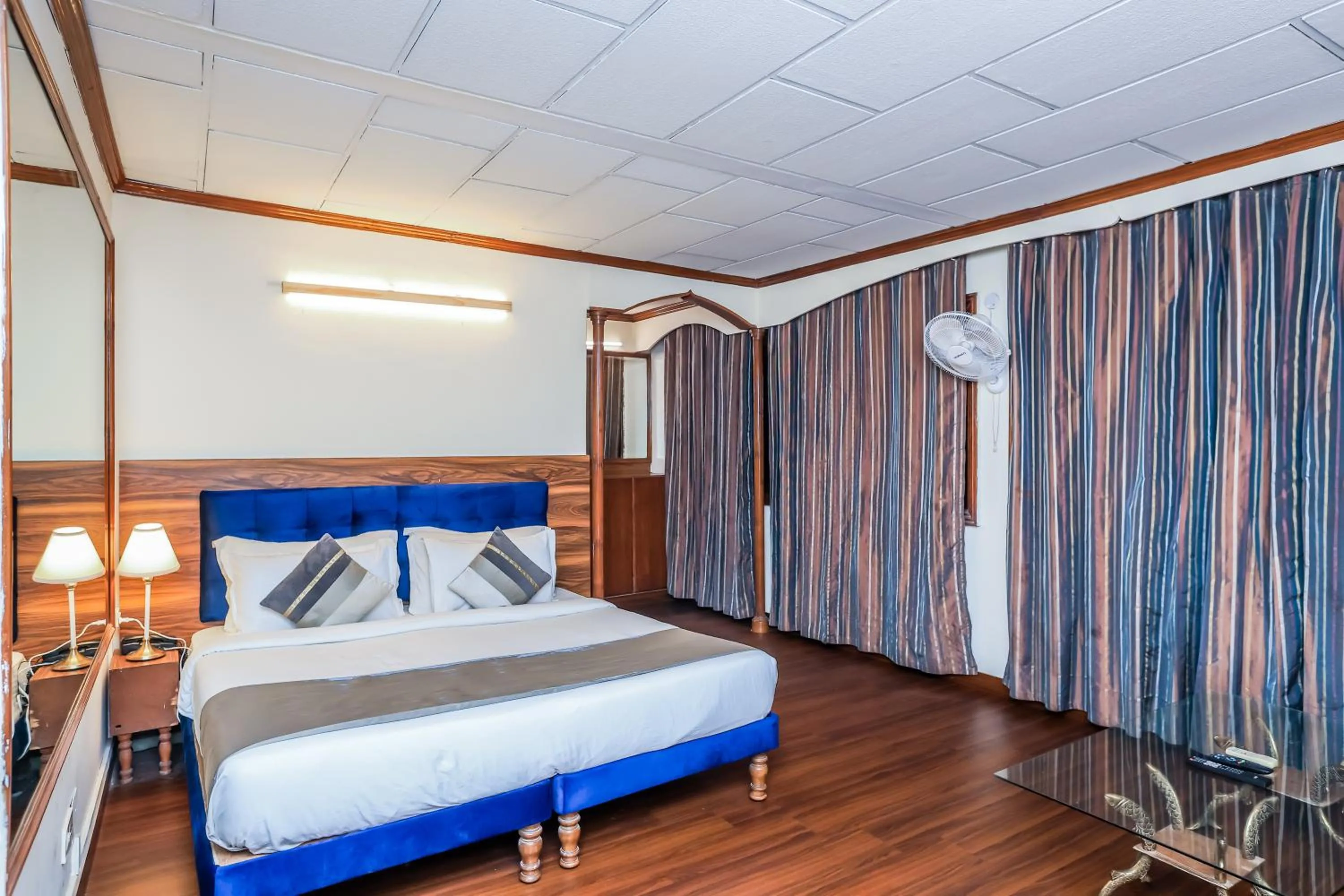 Bed in asar CP Outer Circle by Orion Hotels