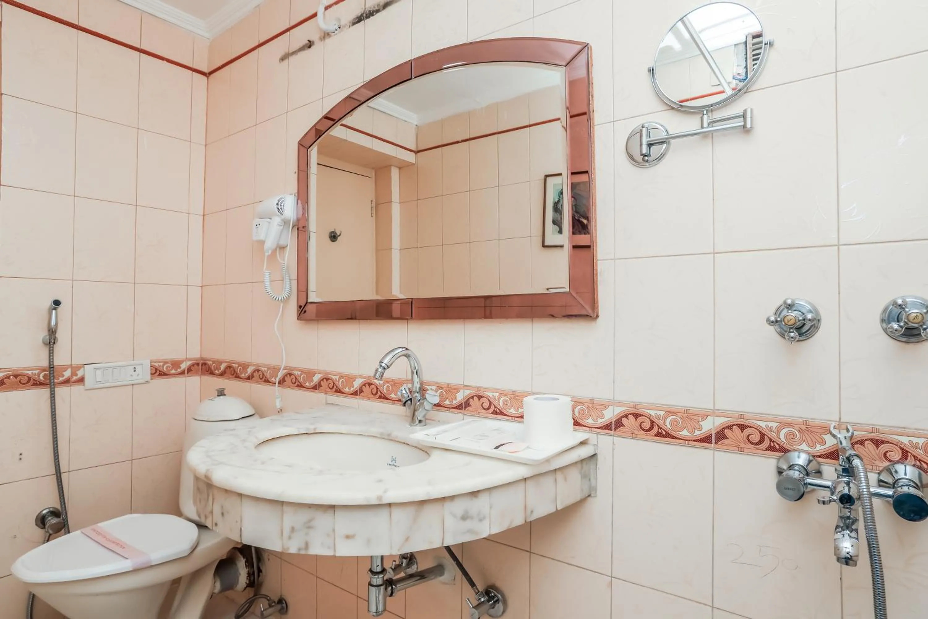 Shower in asar CP Outer Circle by Orion Hotels