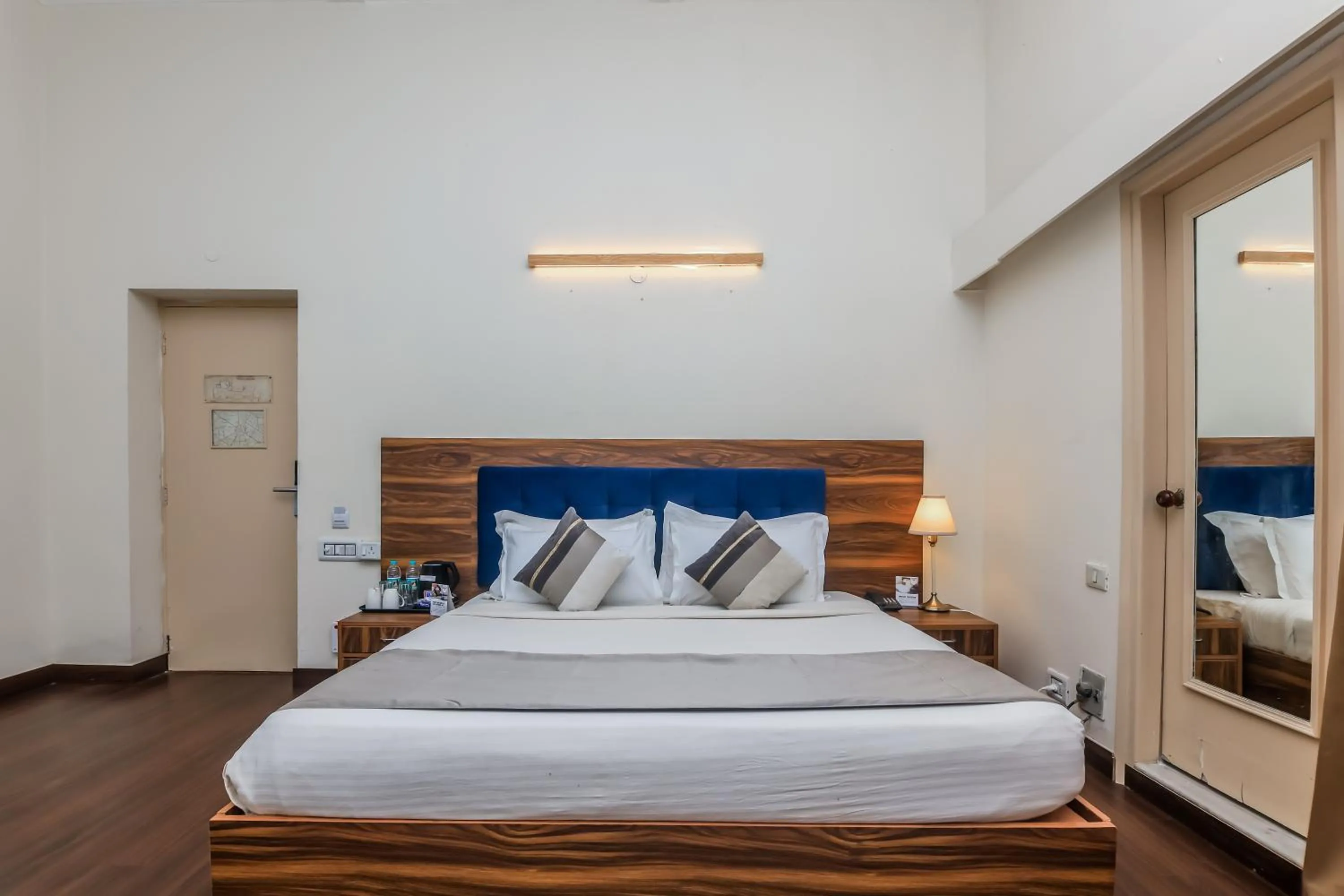 Bed in asar CP Outer Circle by Orion Hotels