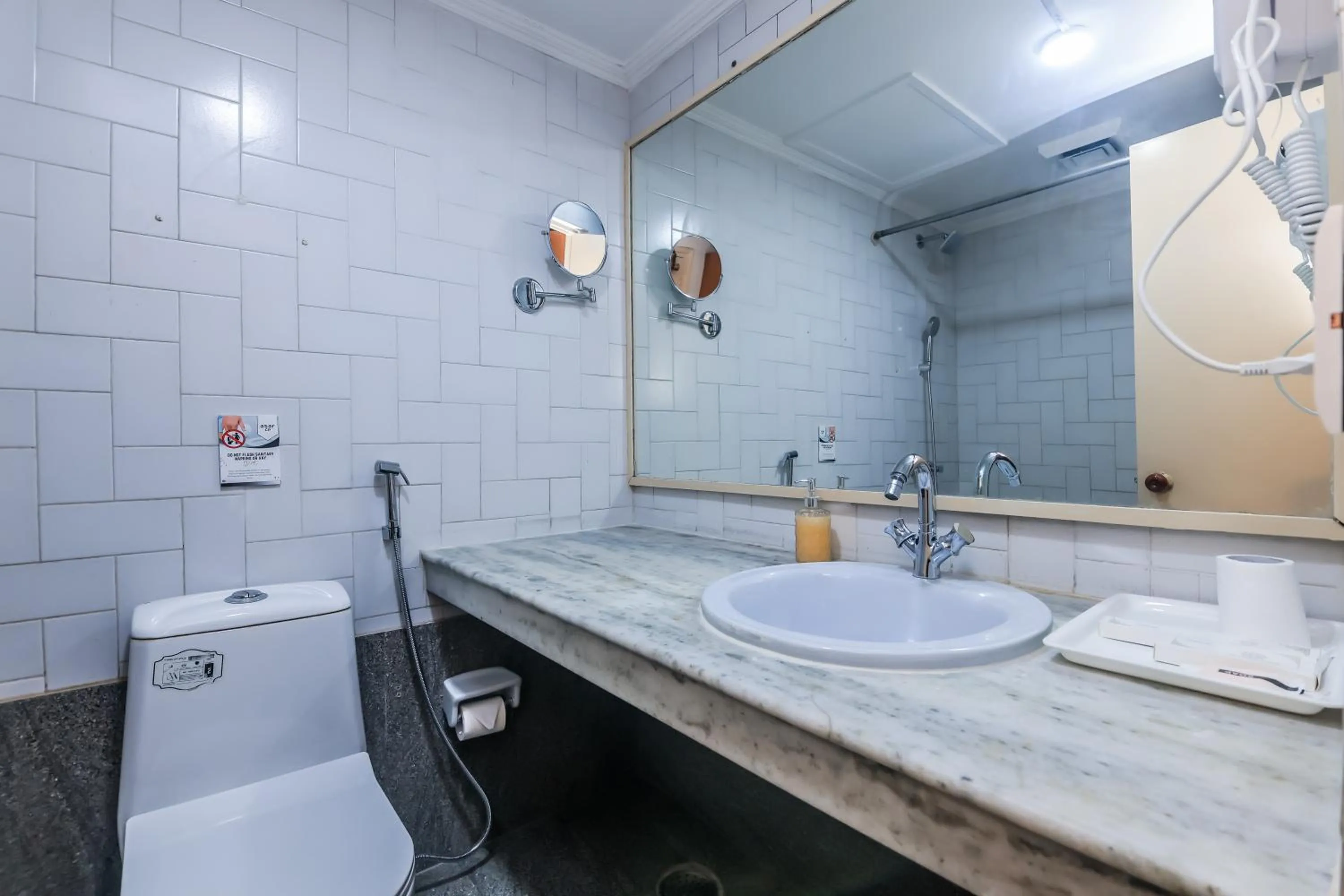 Bathroom in asar CP Outer Circle by Orion Hotels