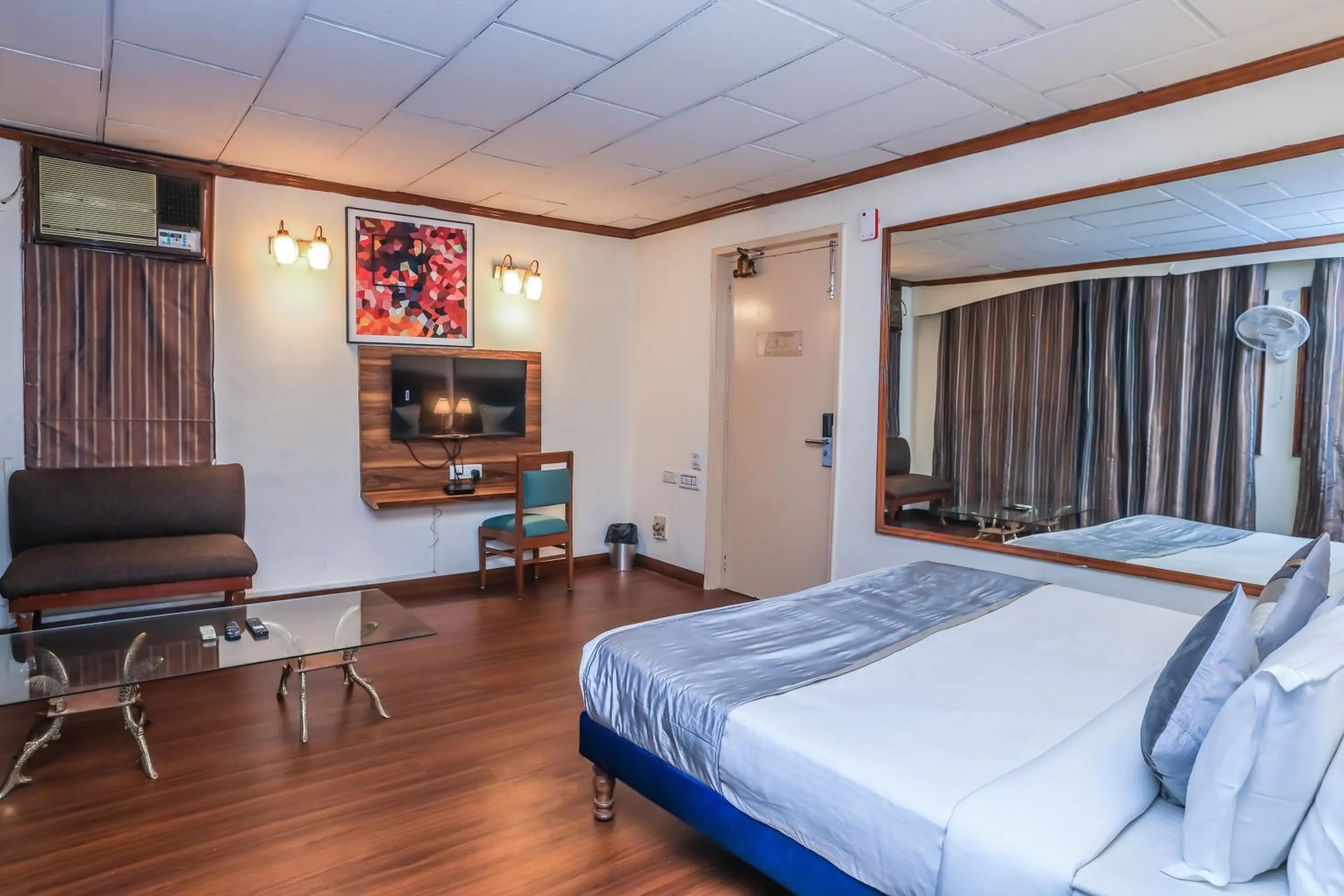Bed in asar CP Outer Circle by Orion Hotels
