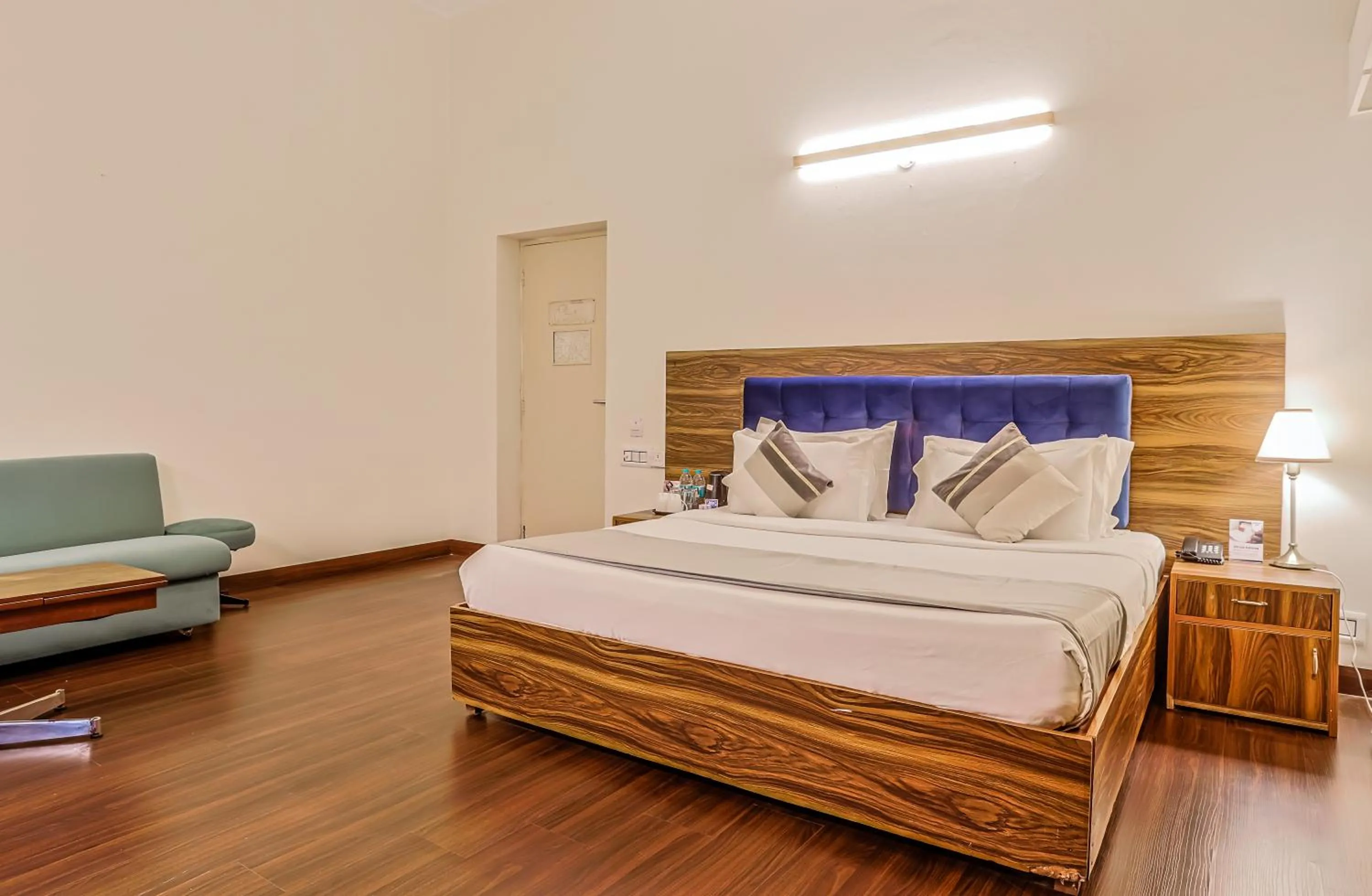 Bed in asar CP Outer Circle by Orion Hotels