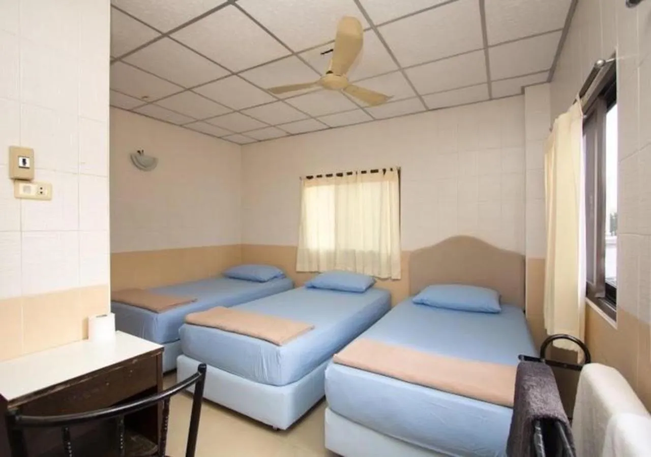 Bed in At Home Guest House