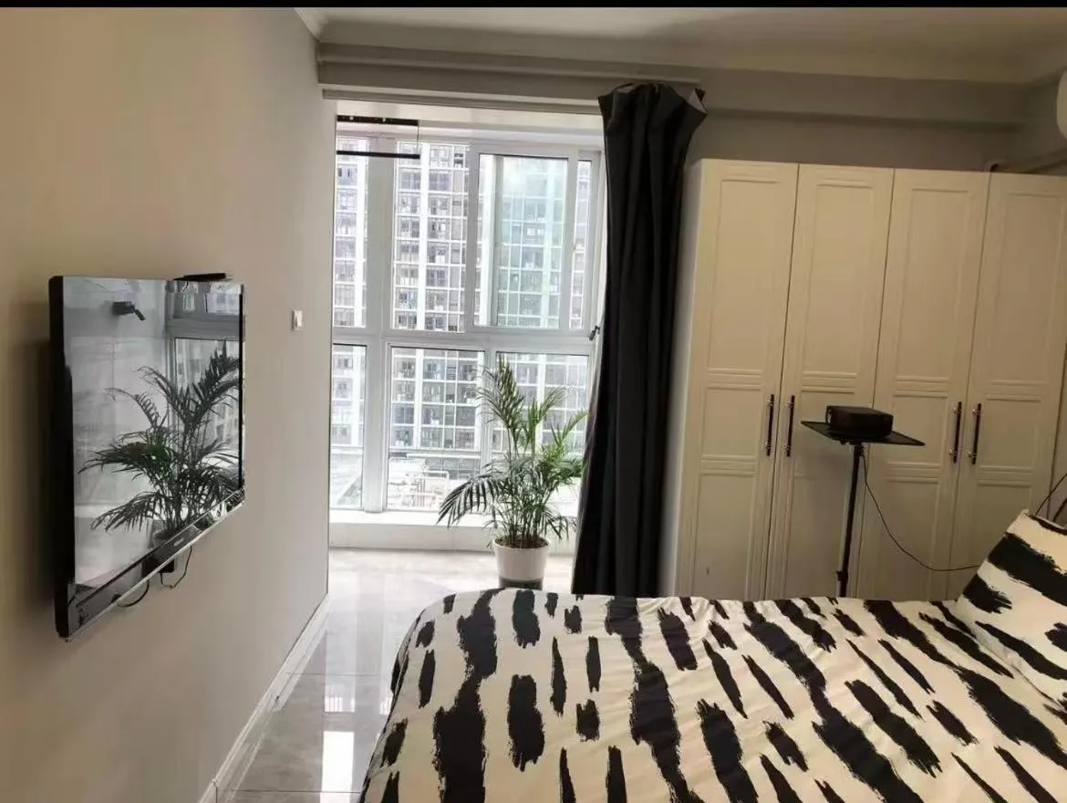Bed in Aisen Apartment Huainan Wanda Plaza Near City Center