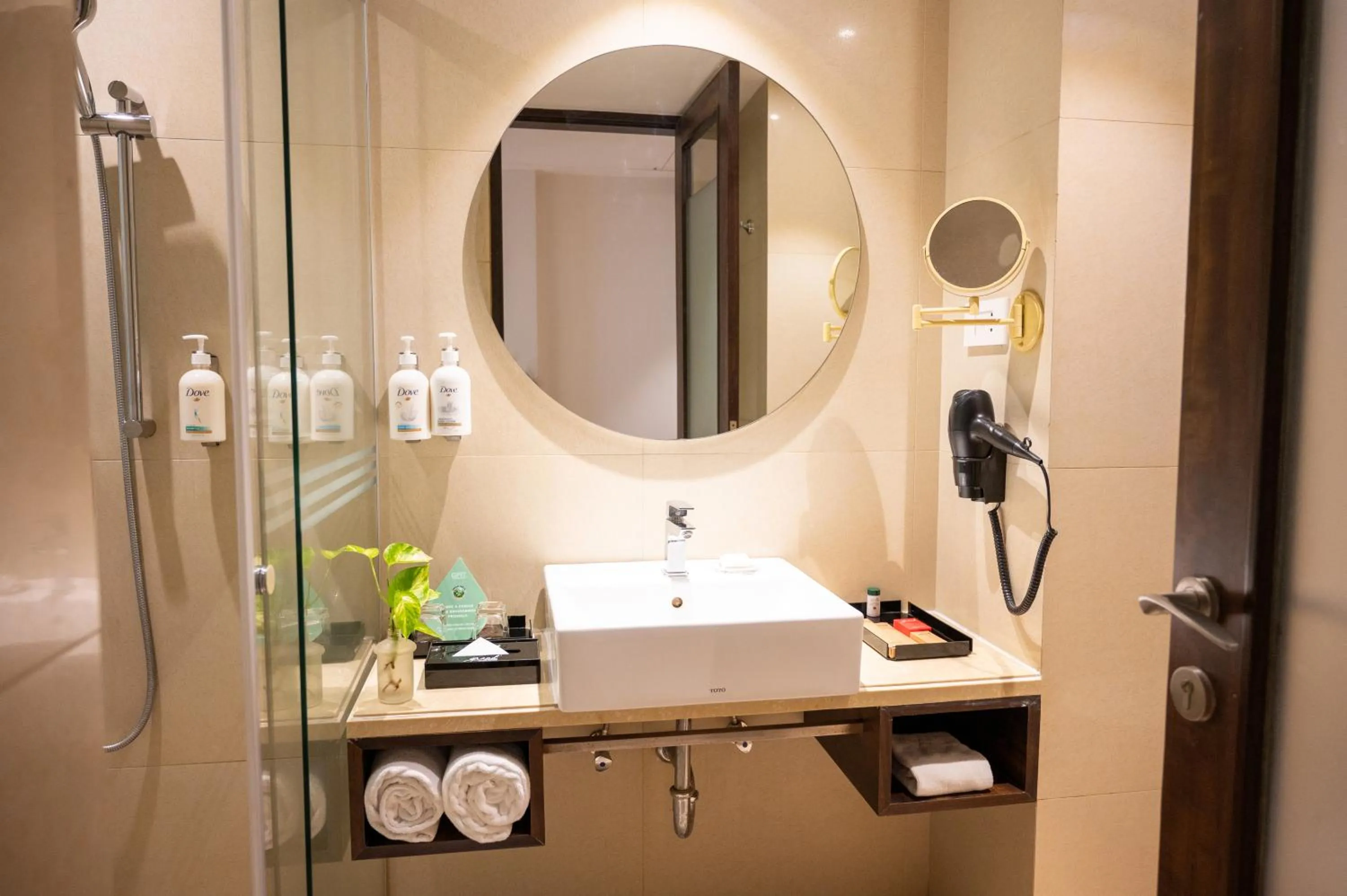 Bathroom in Grand Kakinada by GRT Hotels