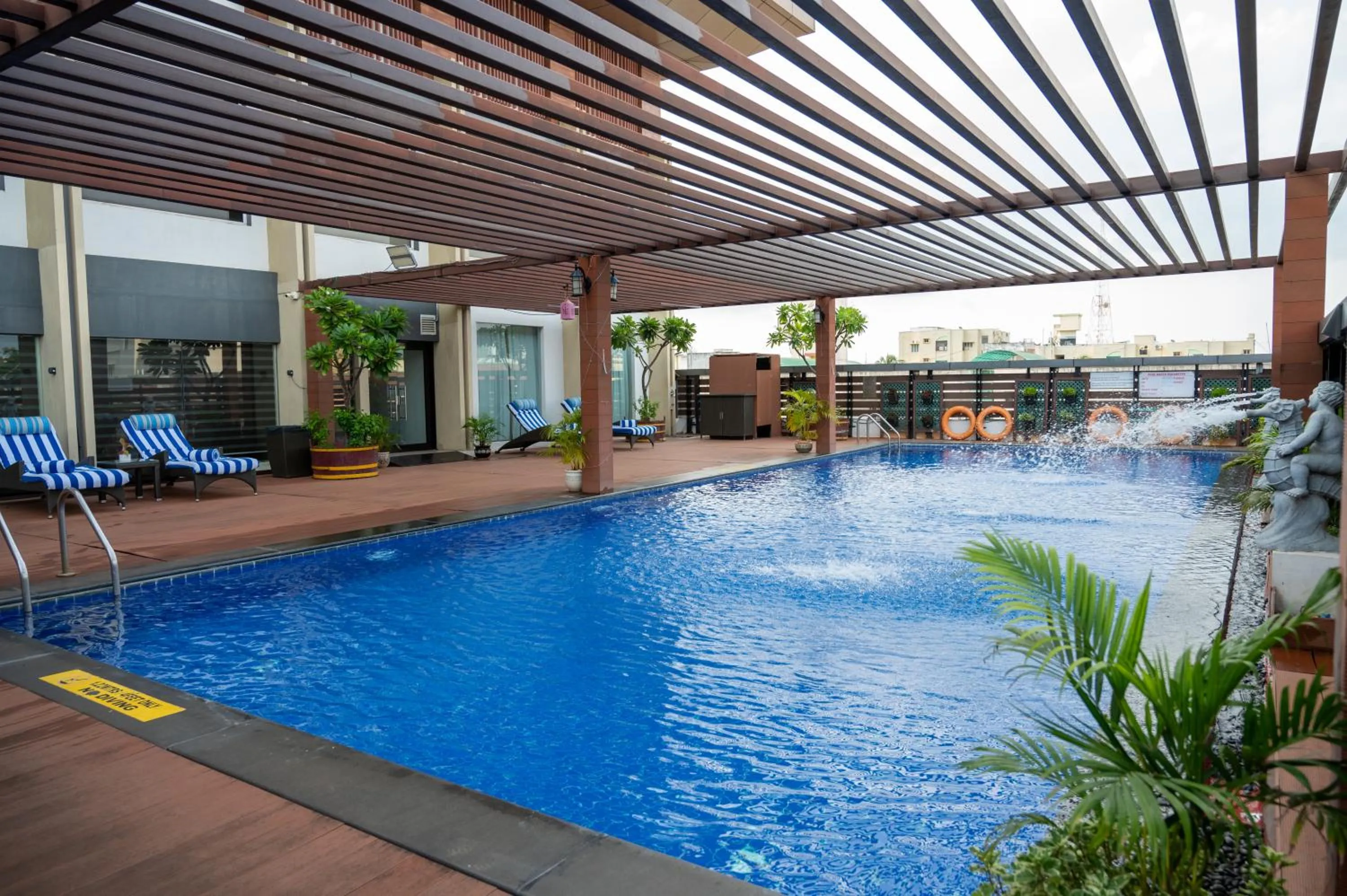 Swimming pool in Grand Kakinada by GRT Hotels