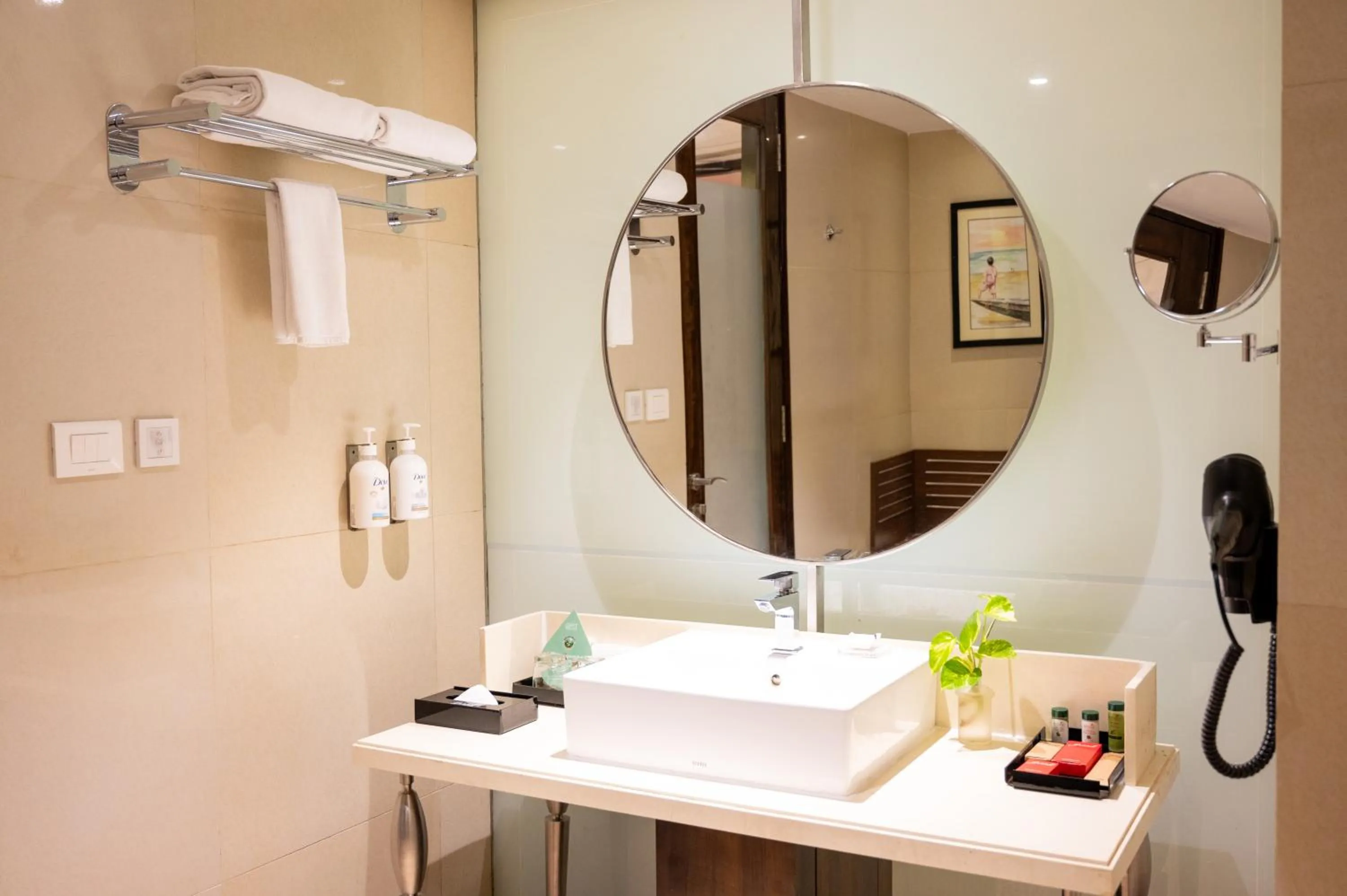 Bathroom in Grand Kakinada by GRT Hotels