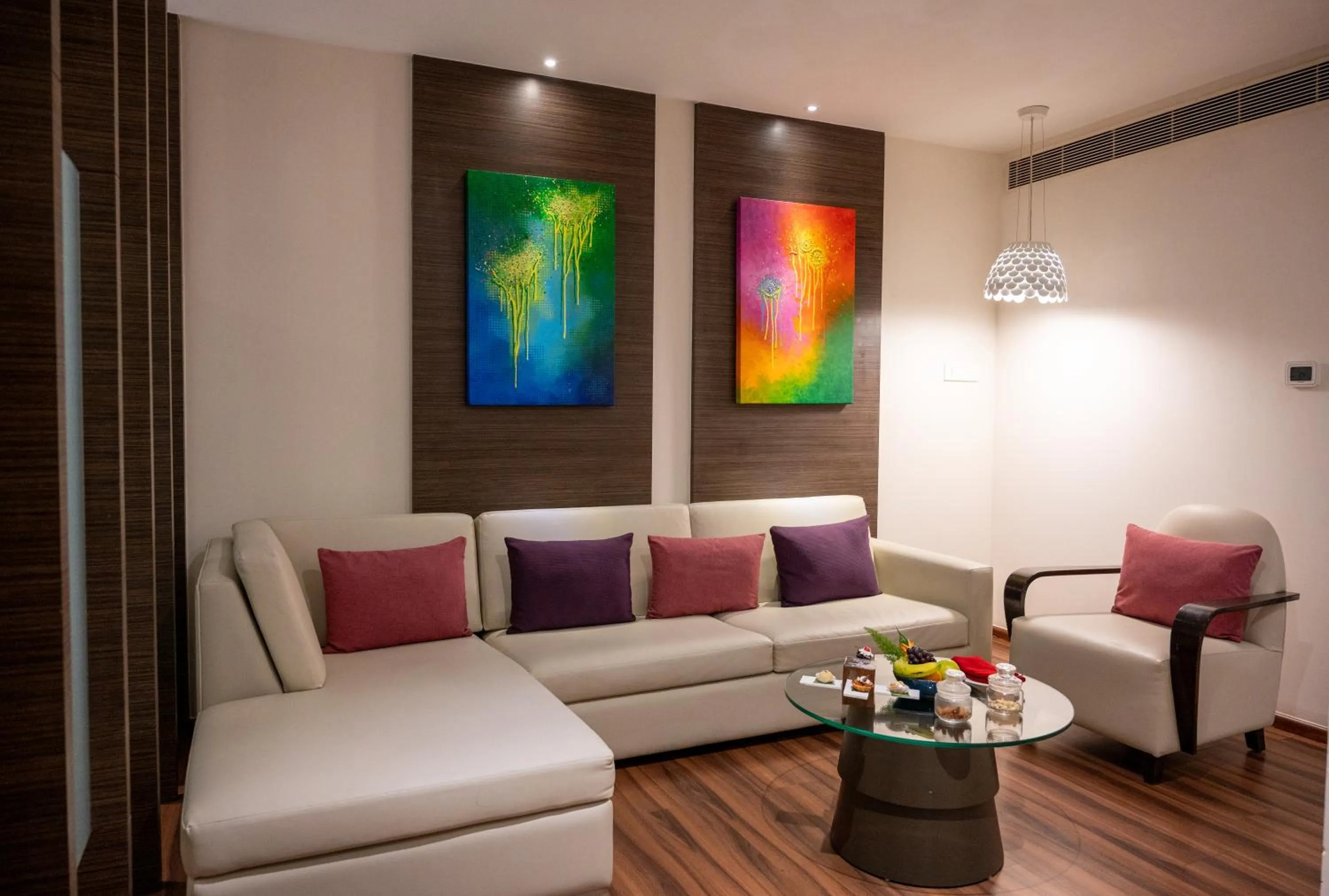 Living room in Grand Kakinada by GRT Hotels