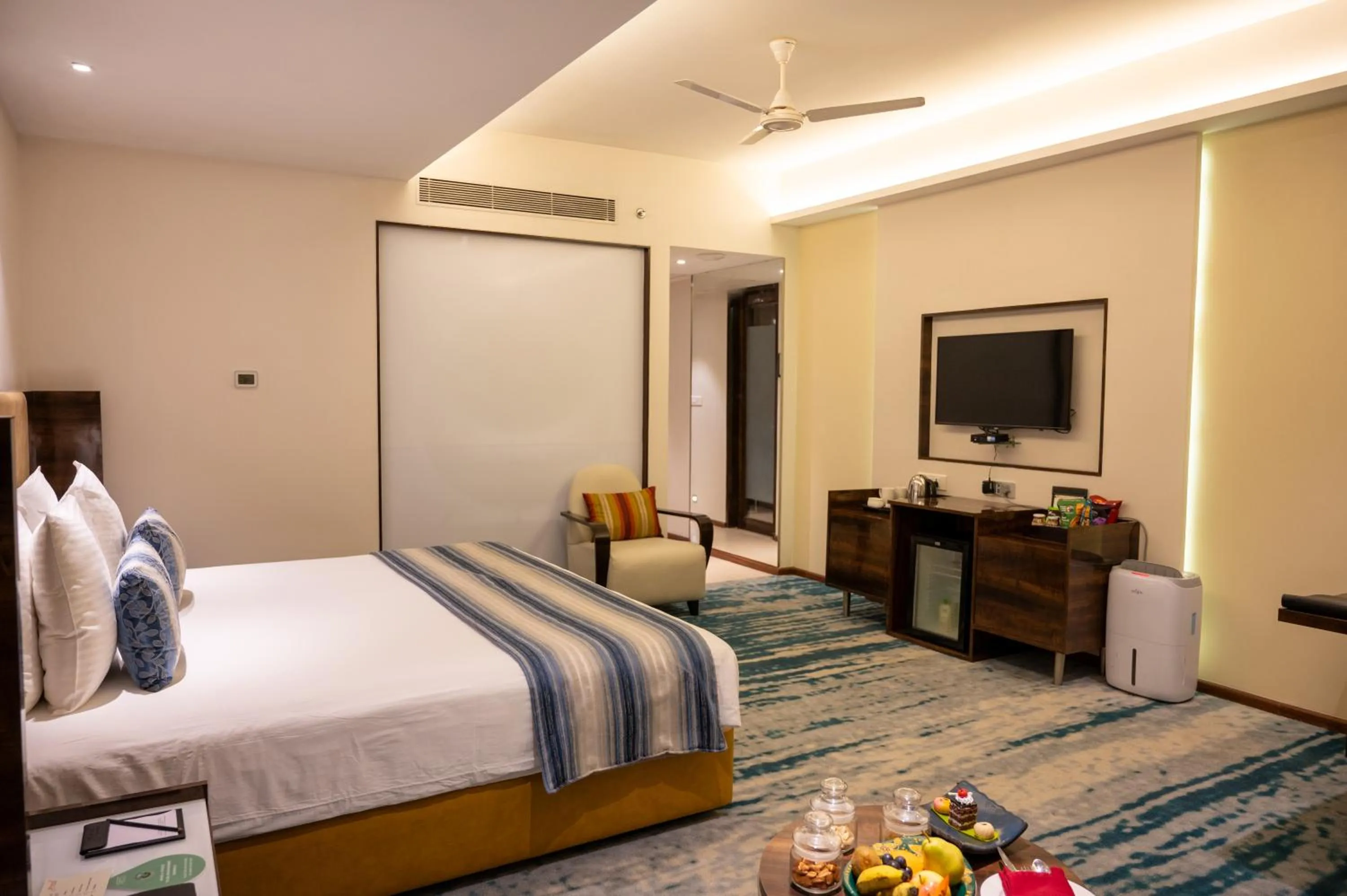 Bedroom, Bed in Grand Kakinada by GRT Hotels