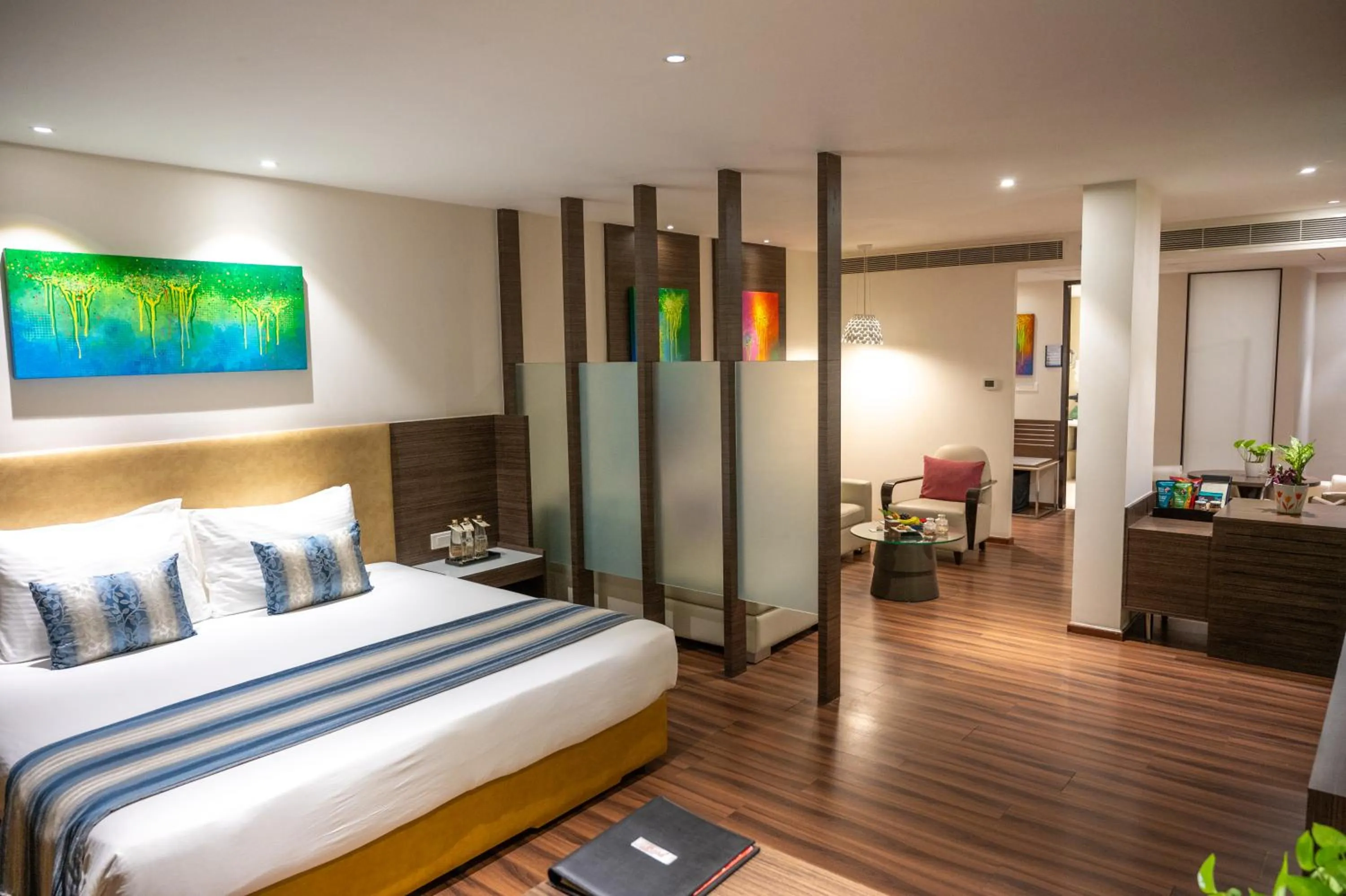 Living room, Bed in Grand Kakinada by GRT Hotels