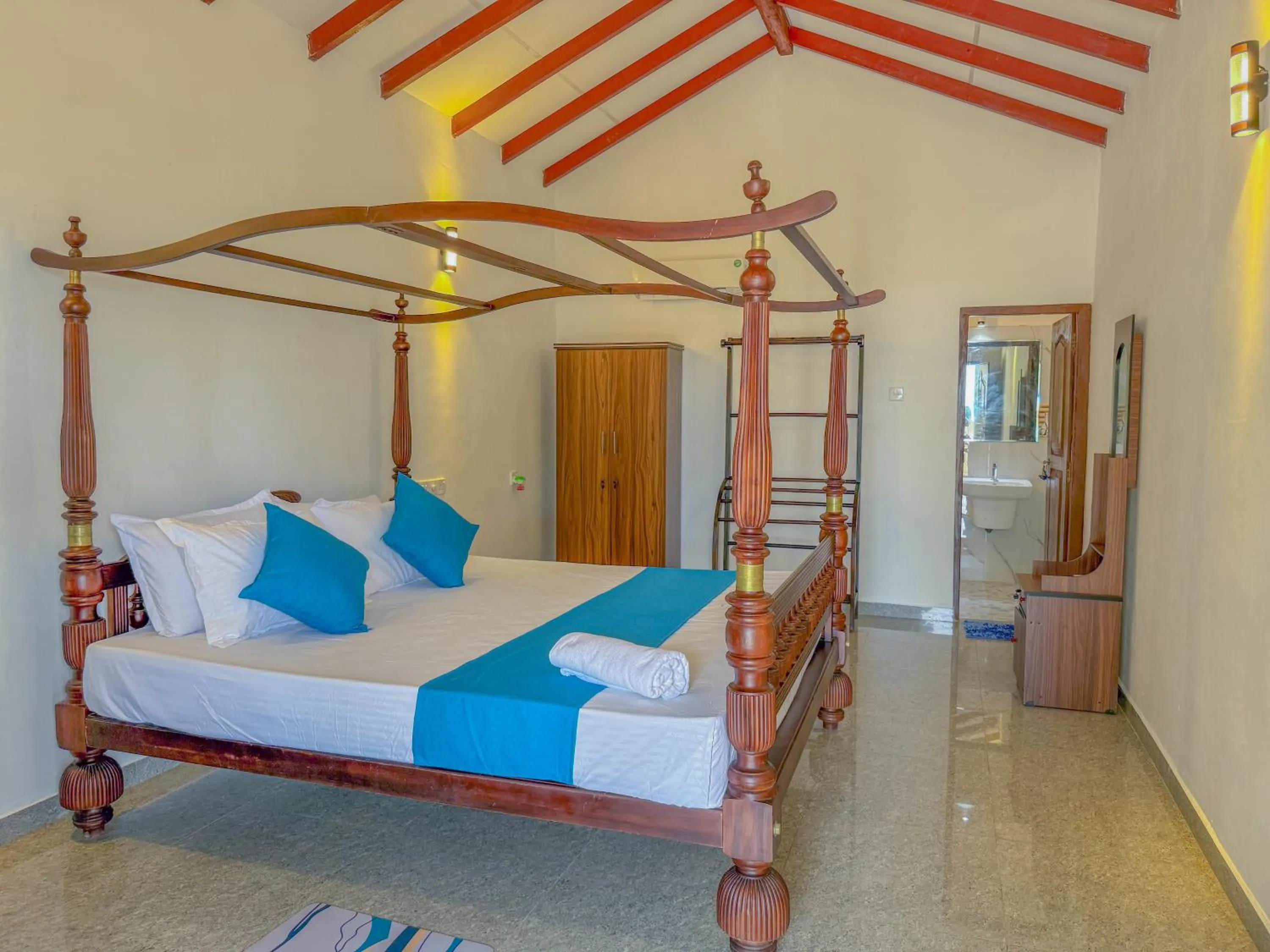 Photo of the whole room, Bed in Blue Water Paradise Akurala