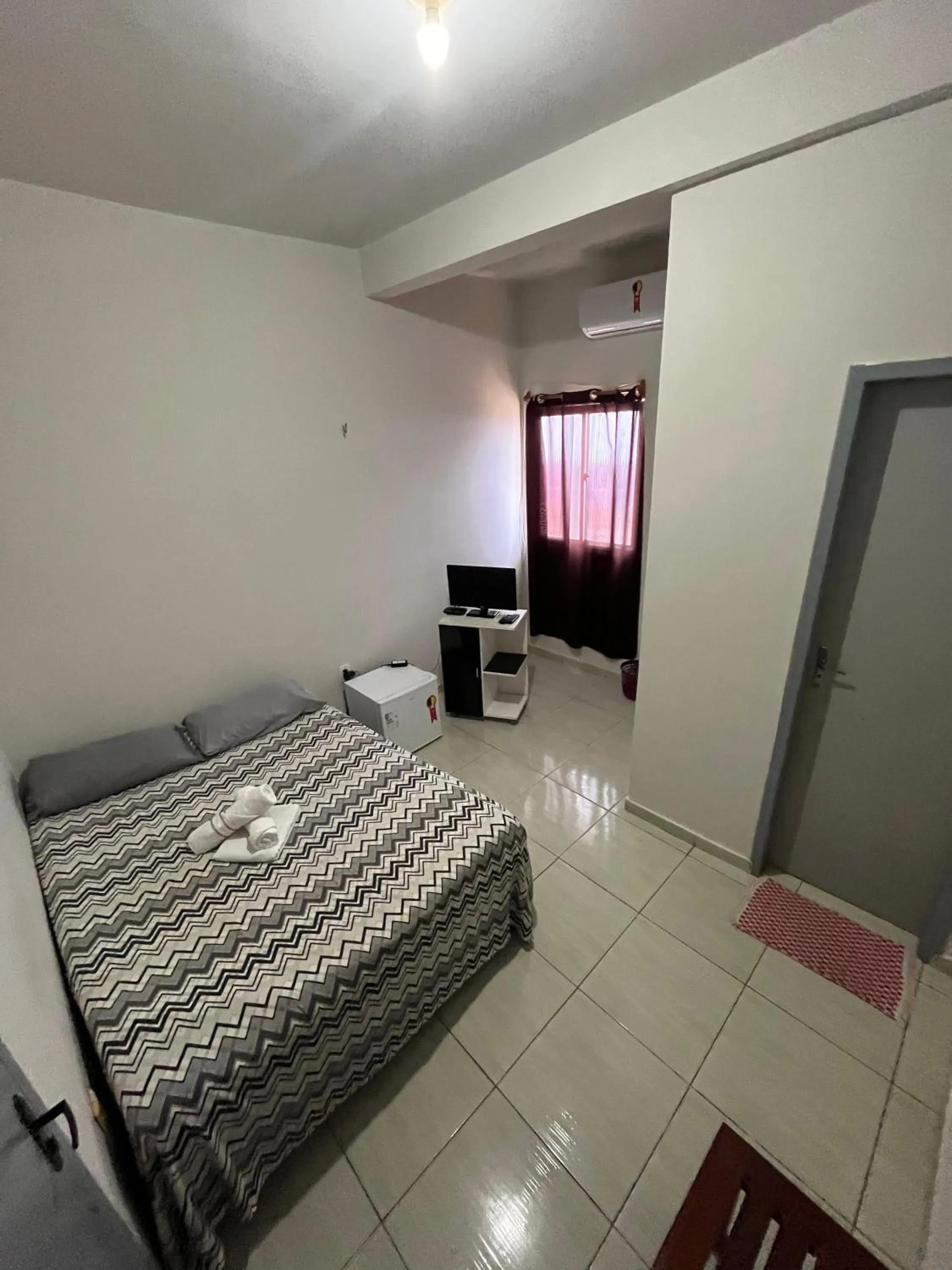 Bed in Pousada santos