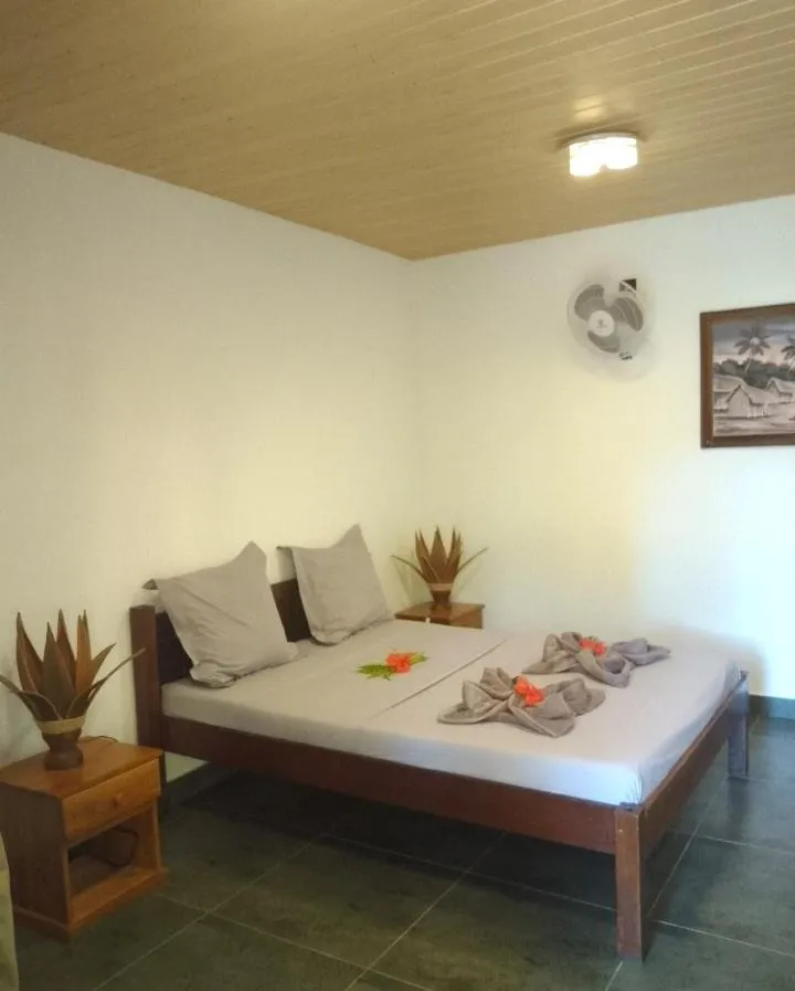 Bed in Tropic Hôtel