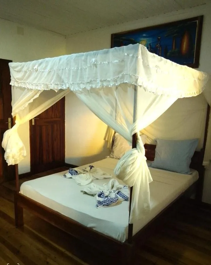 Bed in Tropic Hôtel
