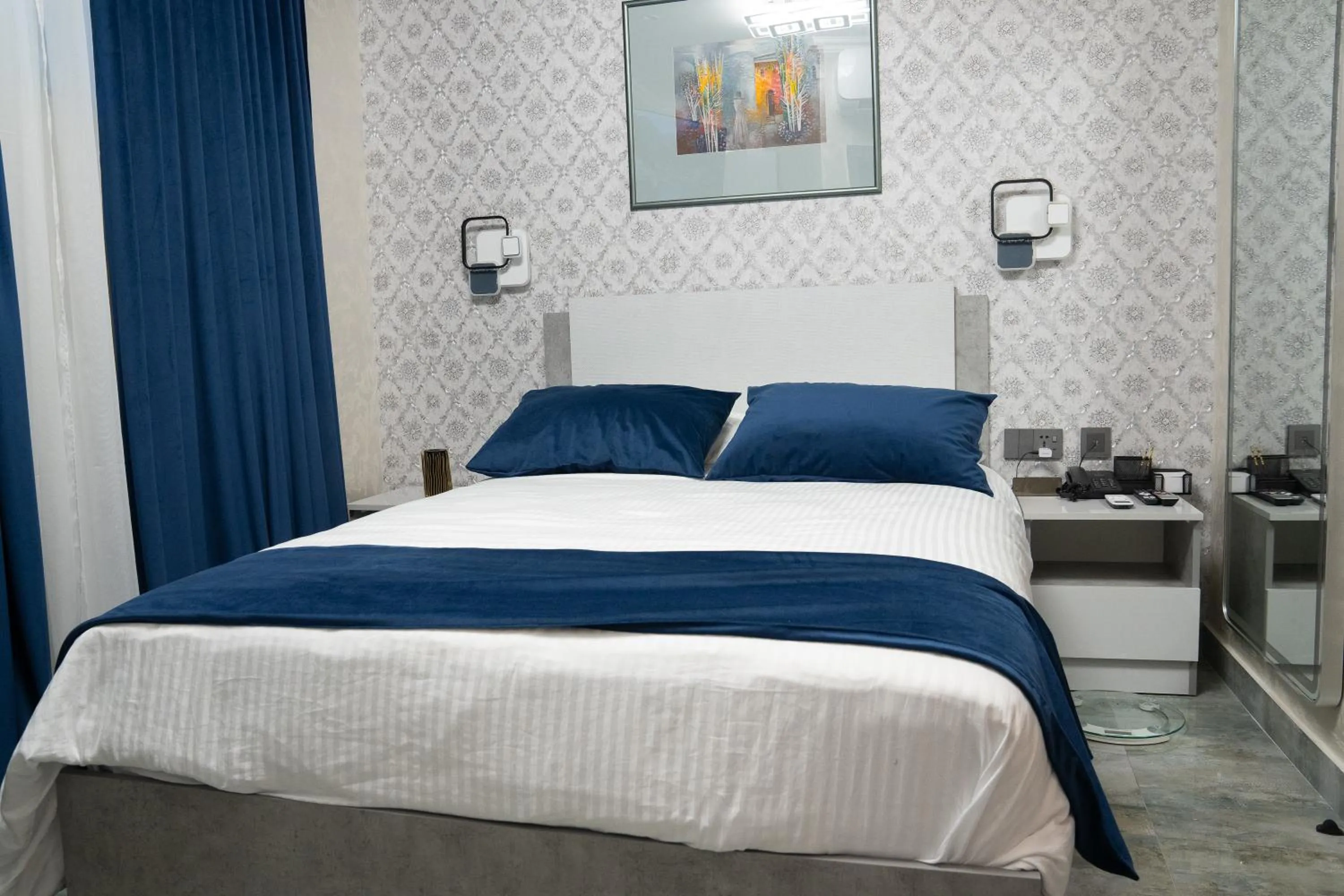 Bed in Prime Suites Hotel