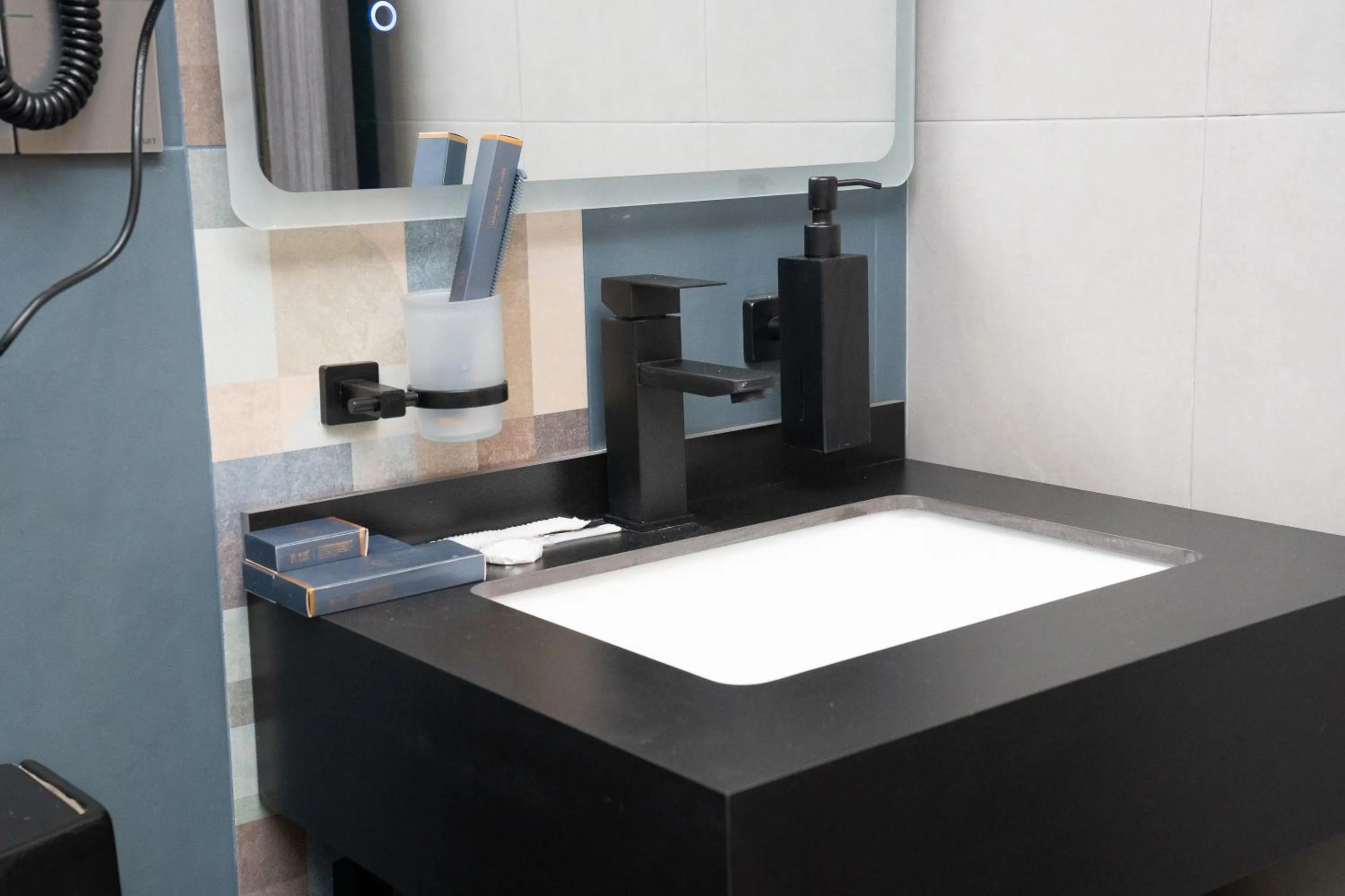 Bathroom in Prime Suites Hotel