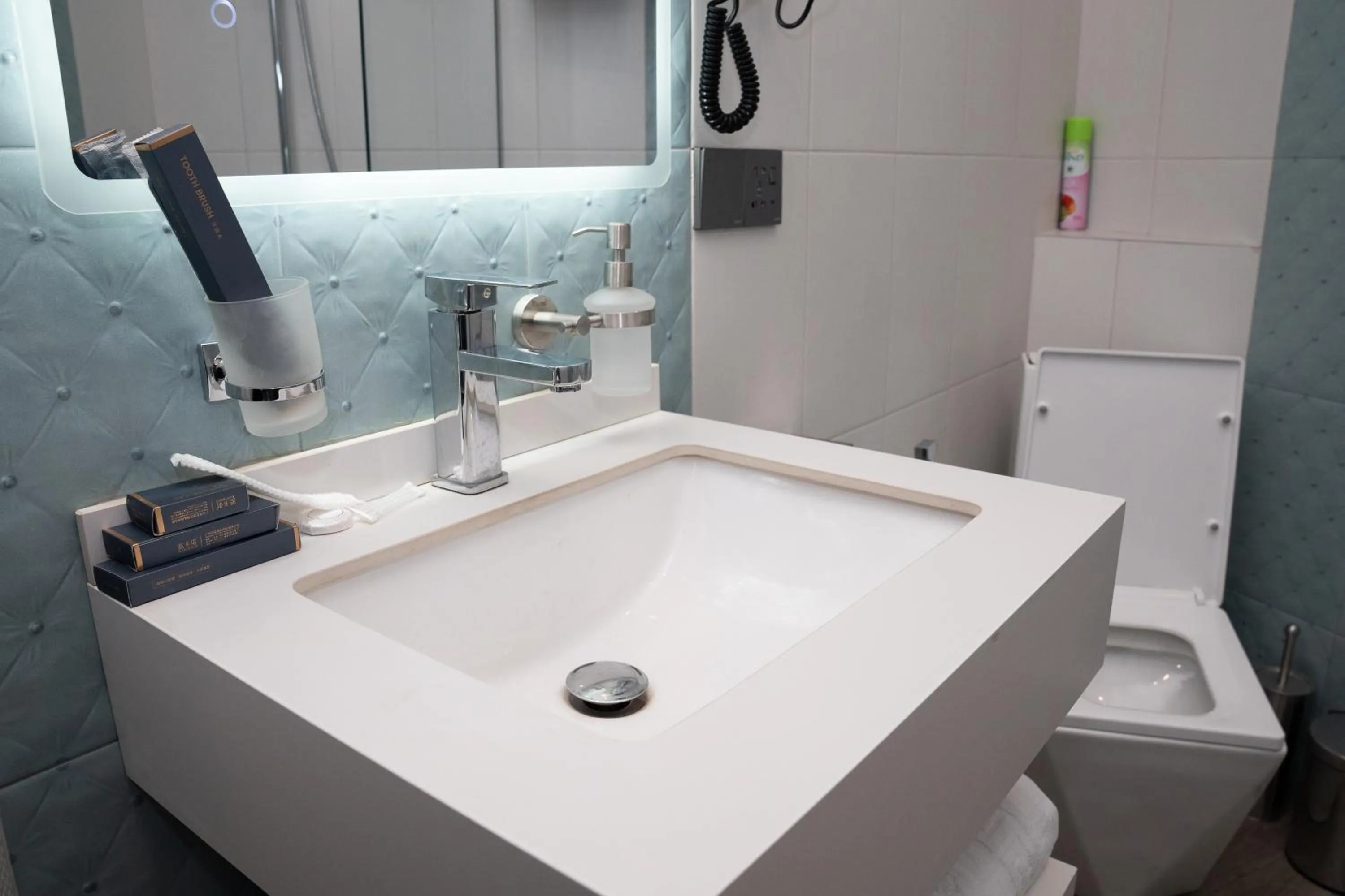 Toilet in Prime Suites Hotel