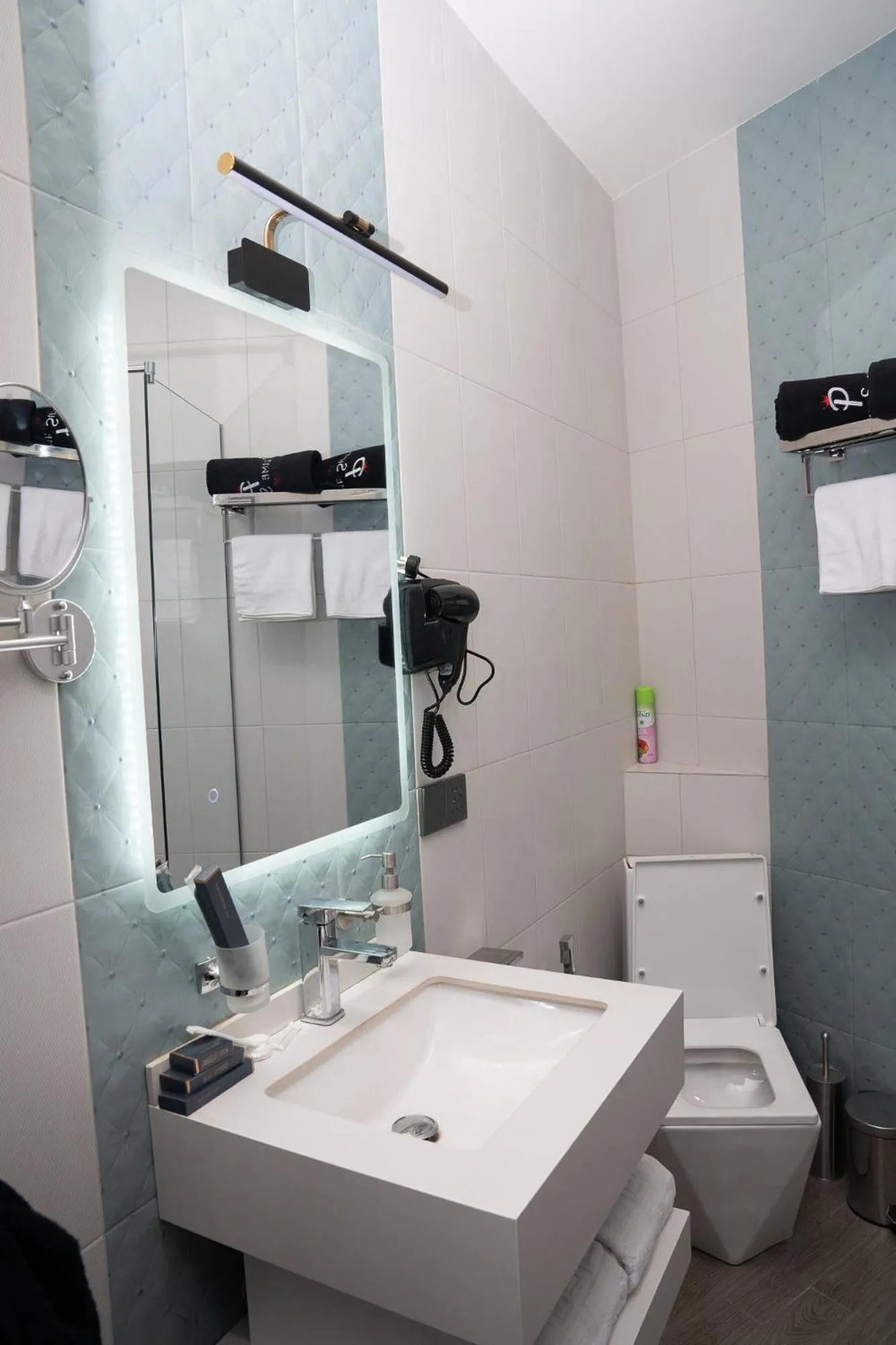 Toilet in Prime Suites Hotel