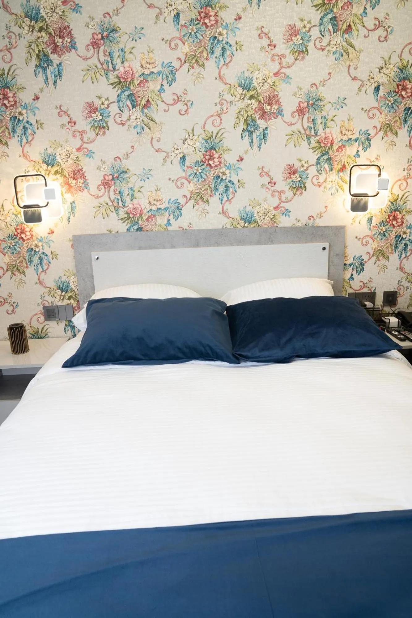 Bed in Prime Suites Hotel