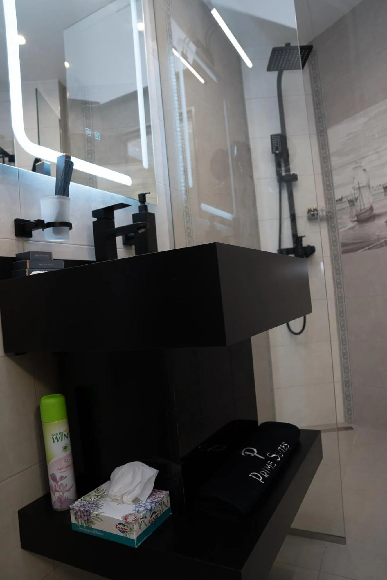 Shower in Prime Suites Hotel