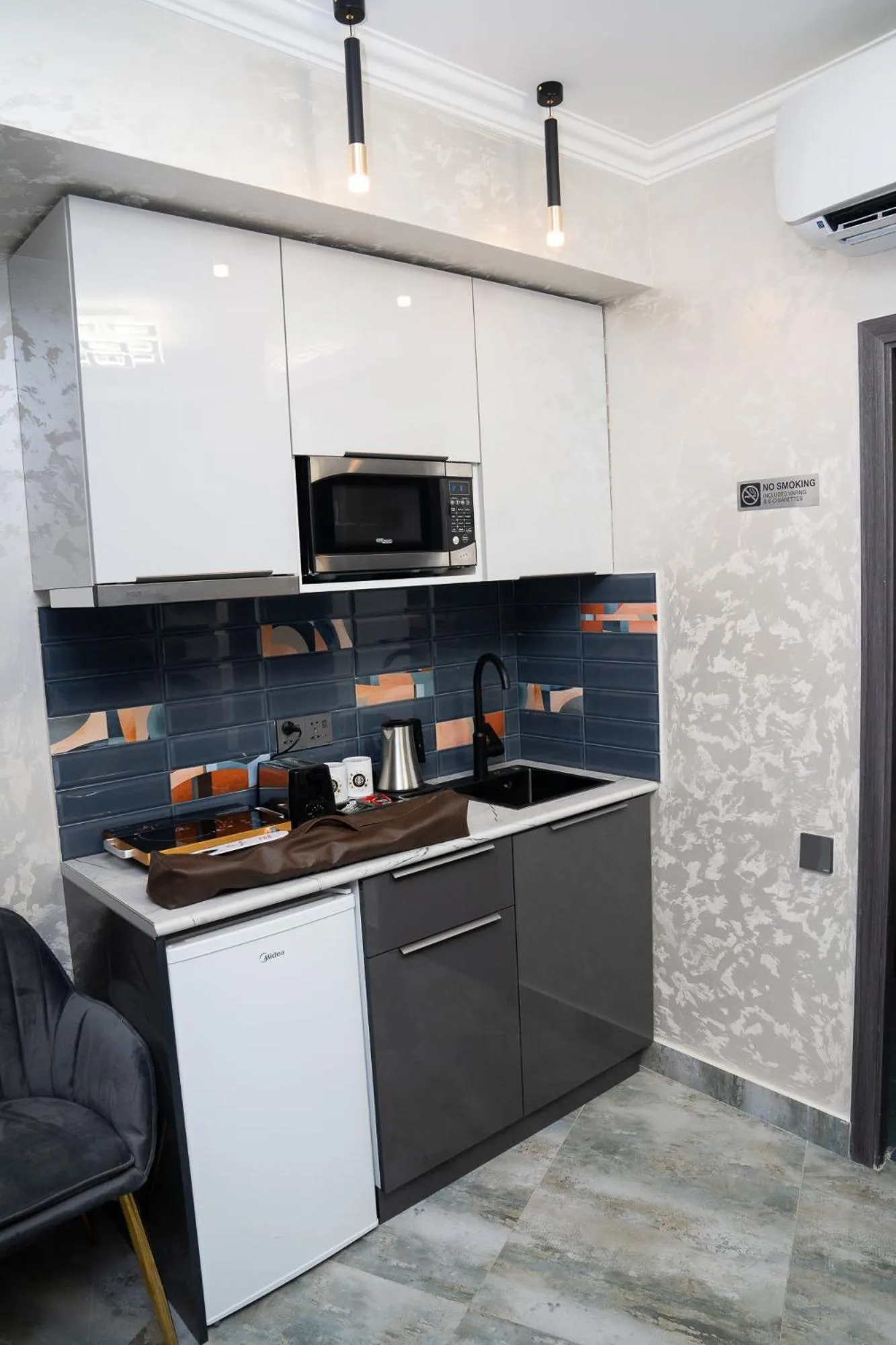 Kitchen or kitchenette in Prime Suites Hotel