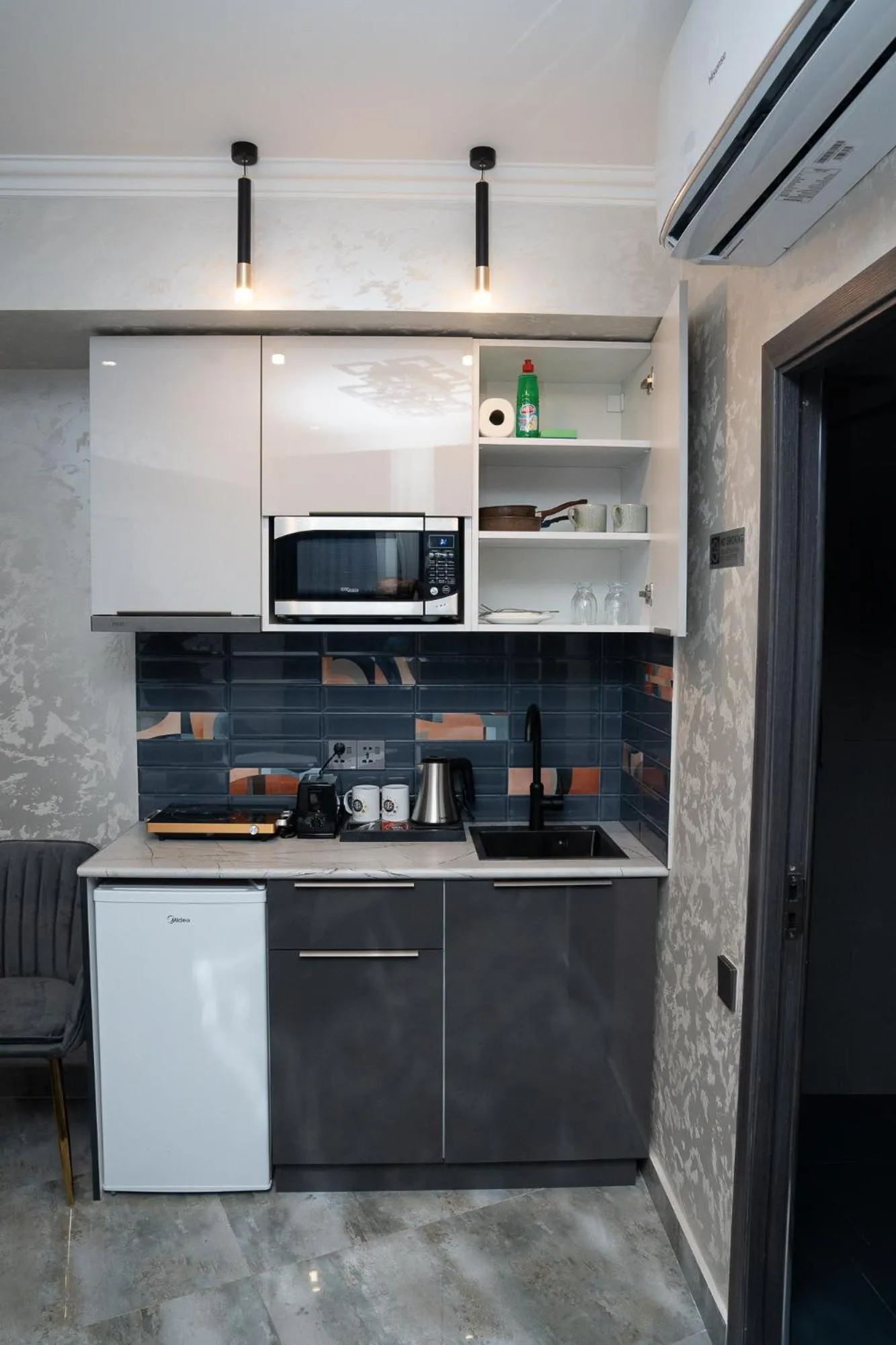 Kitchen or kitchenette in Prime Suites Hotel